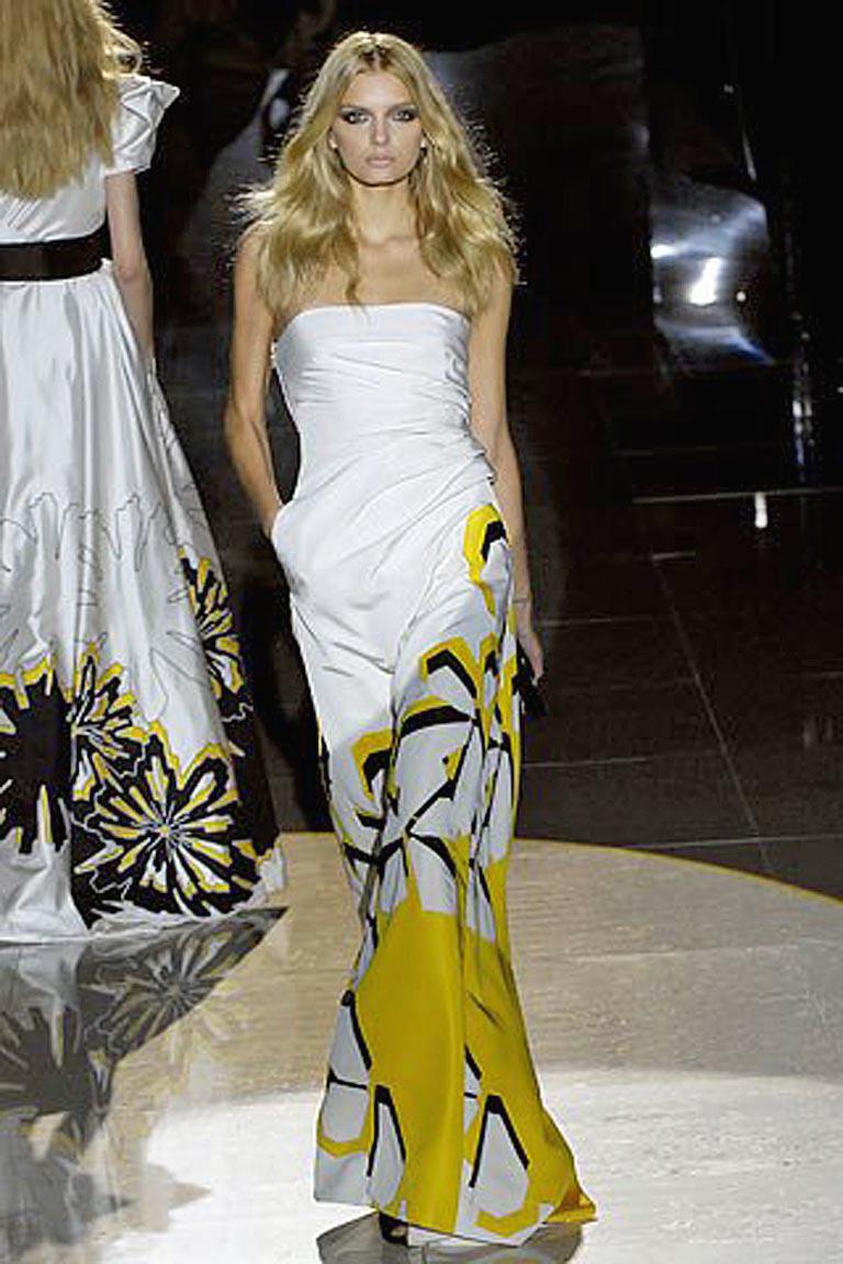 Fabulous, imaginative, and over-the-top Runway Gucci gown from the 2008 runway collection. This collection boasts dramatic dresses and gowns accompanied with oversize horsebit belts, a Gucci style signature.  A hard-to-find piece.  As featured on