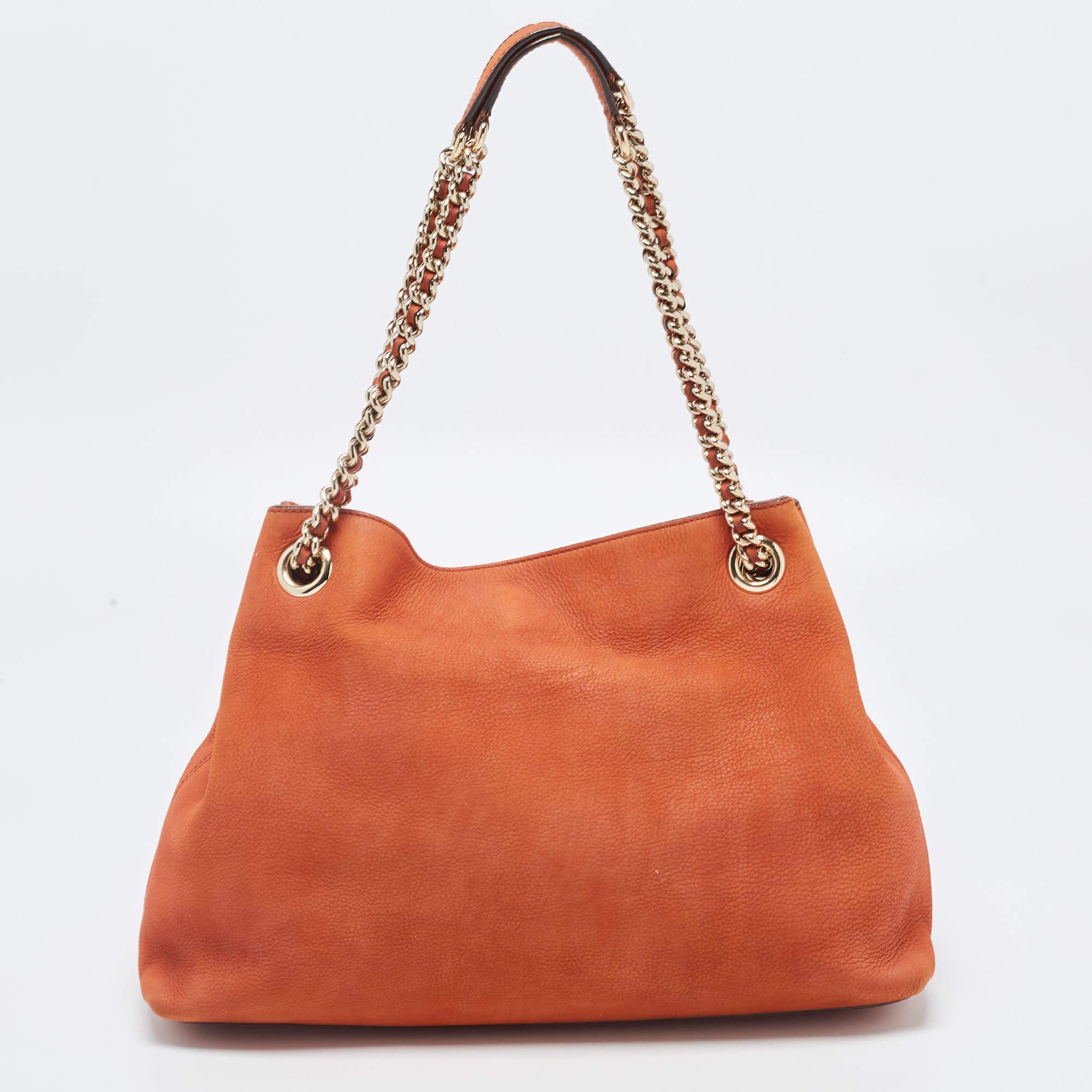 For a look that is complete with style, taste, and a touch of luxe, this designer bag is the perfect addition. Flaunt this beauty on your shoulder and revel in the taste of luxury it leaves you with.

Includes: Original Dustbag

