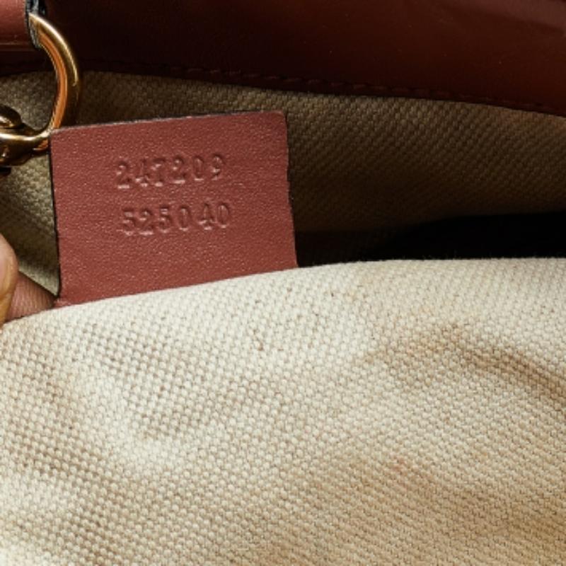 When utility meets high style, we get this Gucci Bree tote. Crafted from Microguccissima leather, this bag features two shoulder handles and a spacious fabric interior to house the things you need. This classic bag can be used day or night. This bag