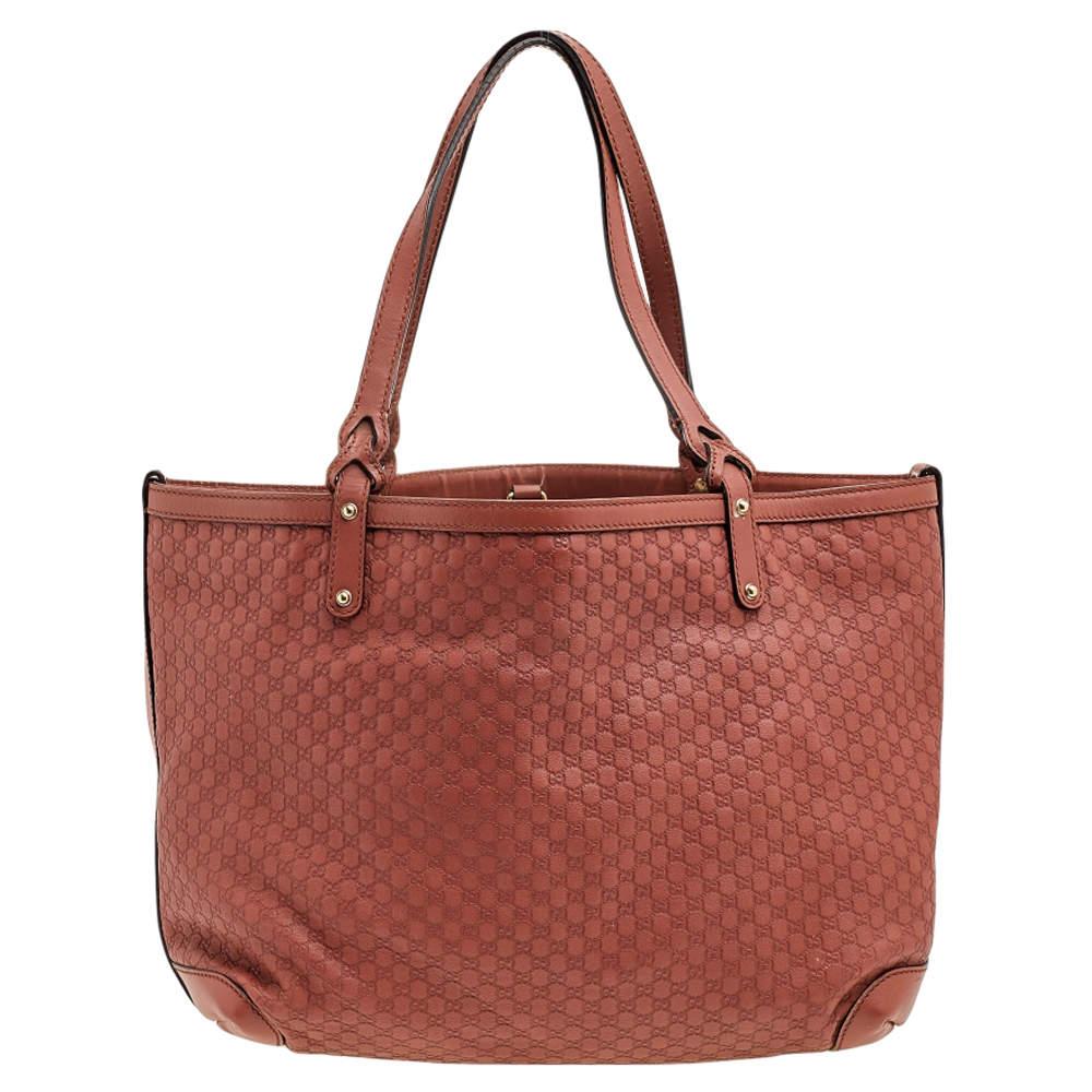 When utility meets high style, we get this Gucci Bree tote. Crafted from Microguccissima leather, this bag features two shoulder handles and a spacious fabric interior to house the things you need. This classic bag can be used day or night. This bag