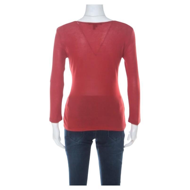 Avec ce haut Gucci, faites du confort et du style votre priorité. Célébrez la mode sans effort avec cette pièce rouge rouille. Confectionné en coton, ce haut à manches longues vous permettra d'être aussi belle que vous vous sentez bien.