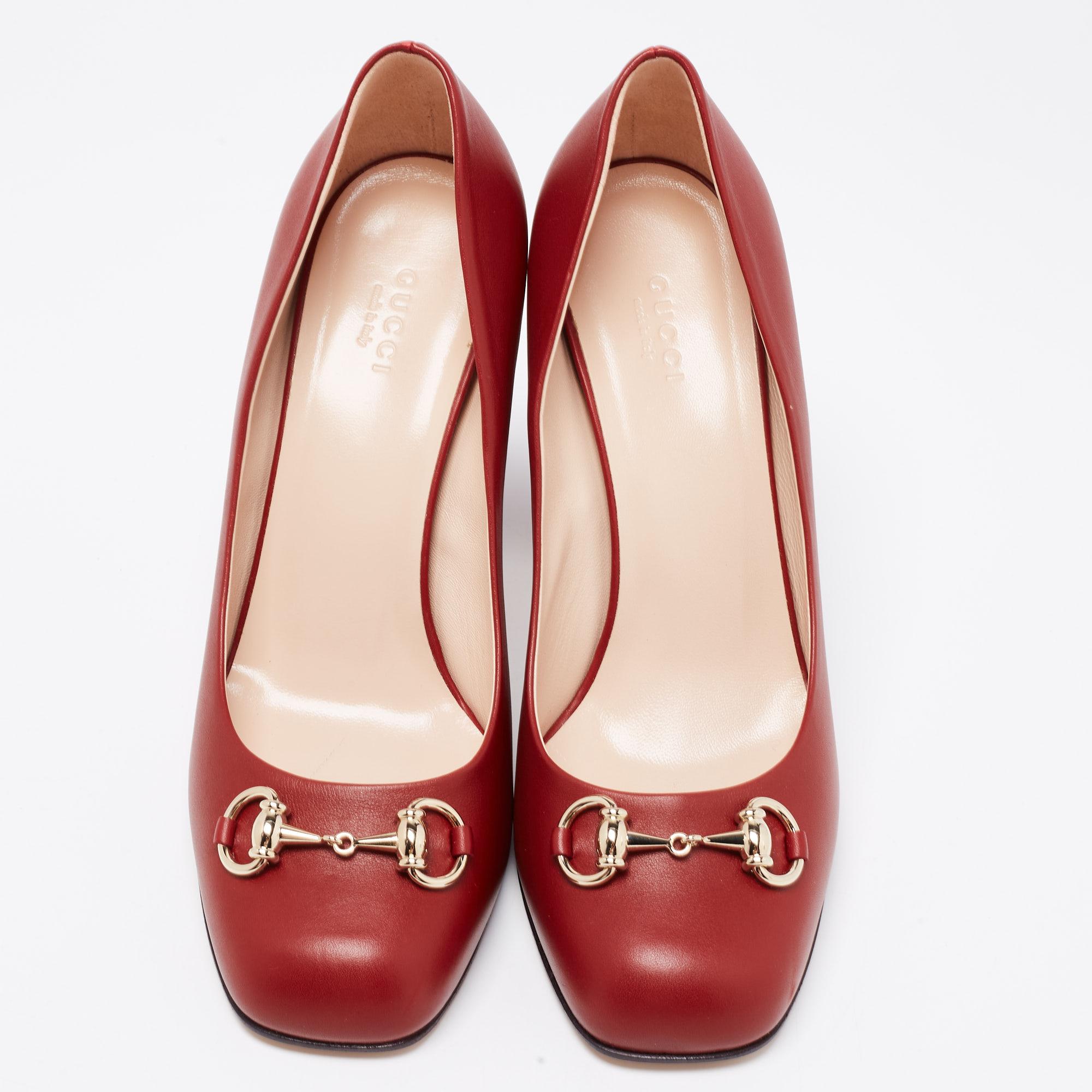 Gucci's pumps are a classy and chic creation that is impossible to resist! From formal outfits to casual attires, these pumps are perfect to wear. These pumps are fashioned in rust-red leather and highlighted with a gold-tone Horsebit motif on the
