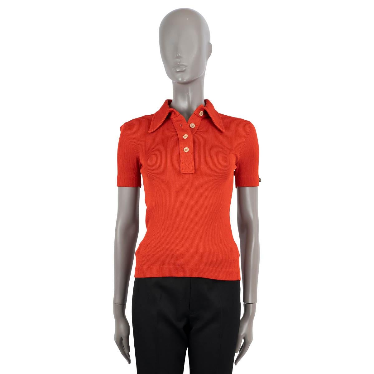100% authentic Gucci rib-knit polo in rust viscose (82%) and polyamide (18%). Features four buttons on the front. Has been worn and is in excellent condition.

2021 Resort

Measurements
Tag Size	XS
Size	XS
Shoulder Width	34cm (13.3in)
Bust From	78cm