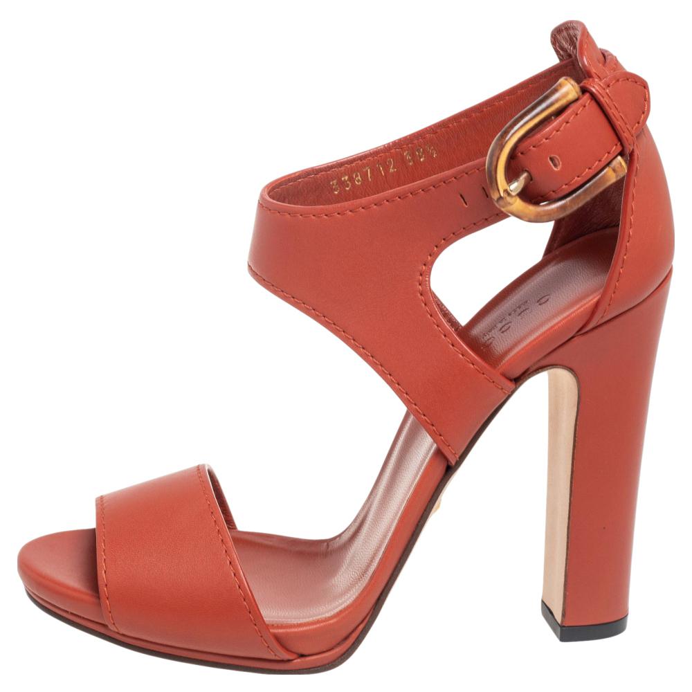 Be a Gucci lady by owning these rusty orange sandals today! Crafted from leather, they have been styled with straps, bamboo buckles at the ankle, and a fabulous set of block heels. The insoles have also been lined with leather and carry the brand's
