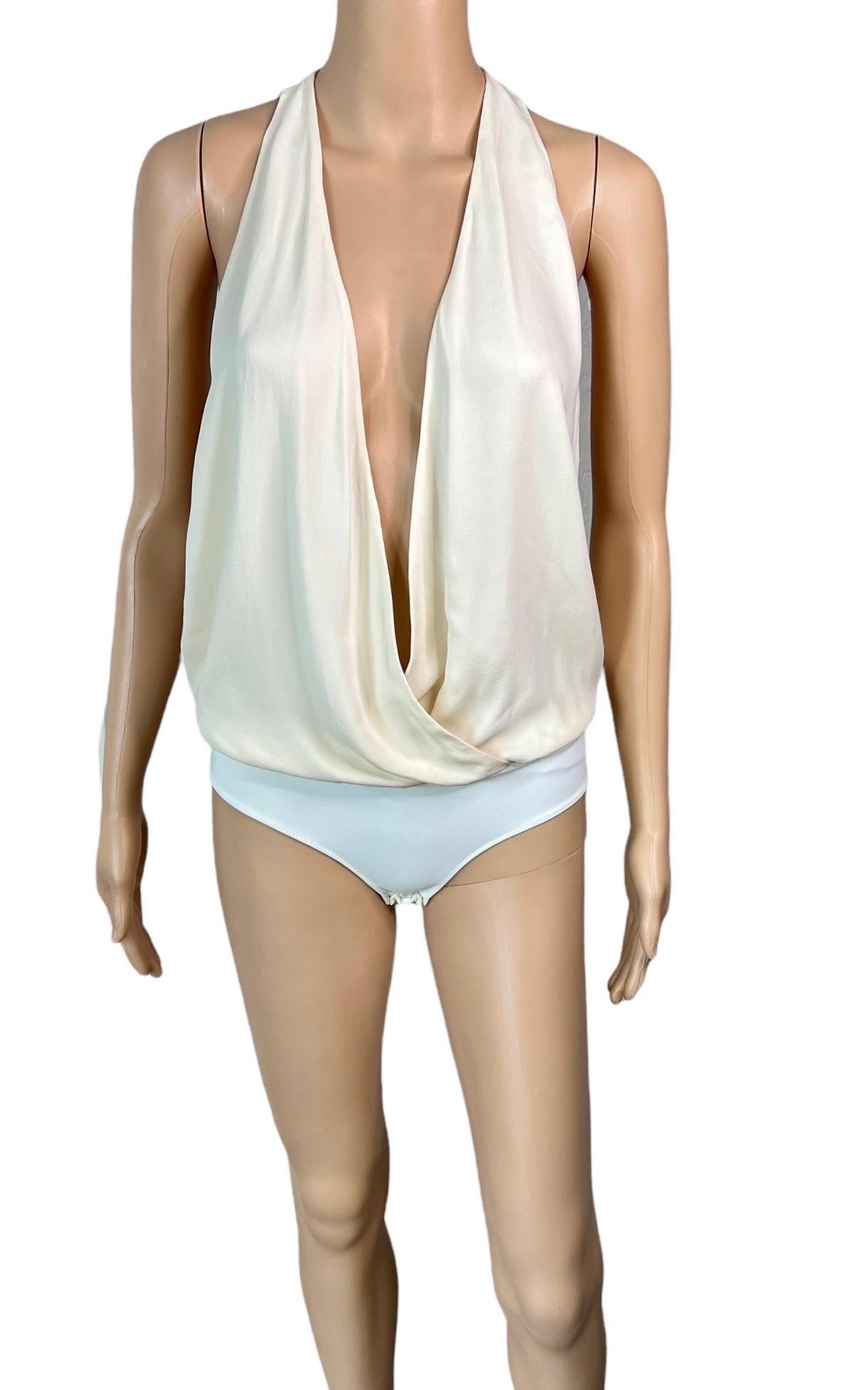 Gucci S/S 2012 Runway Sheer Plunging Neckline Cutout Ivory Bodysuit Top Size IT 38

Featured in multiple looks on the Spring 2012 Runway.