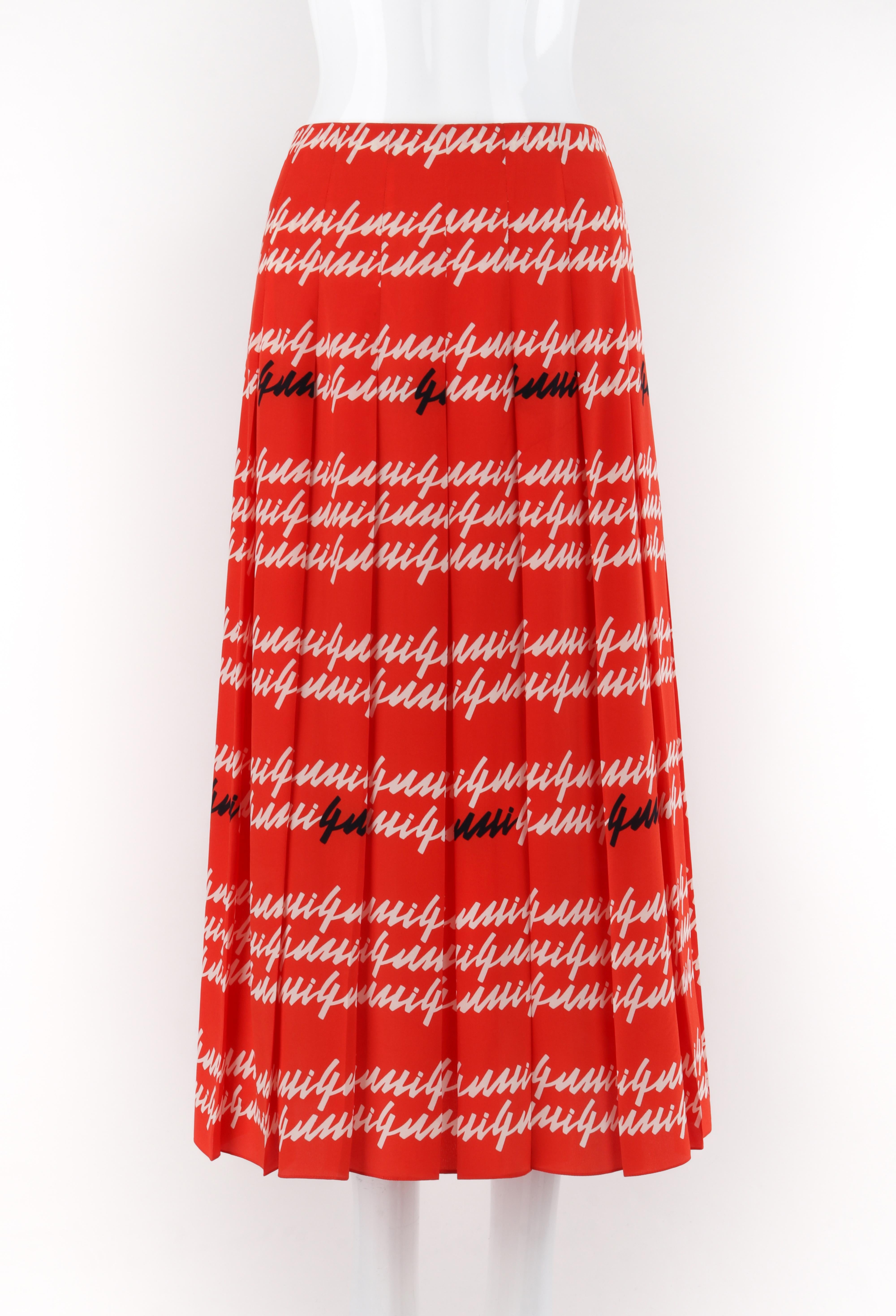 GUCCI S/S 2016 Orange Black White Pleated Silk Scripture Print Maxi Skirt

Brand / Manufacturer: Gucci
Collection: Spring/Summer 2016
Designer: Alessandro Michele
Style: Maxi Skirt
Color(s): Shades of orange, white, black
Lined: No
Marked Fabric