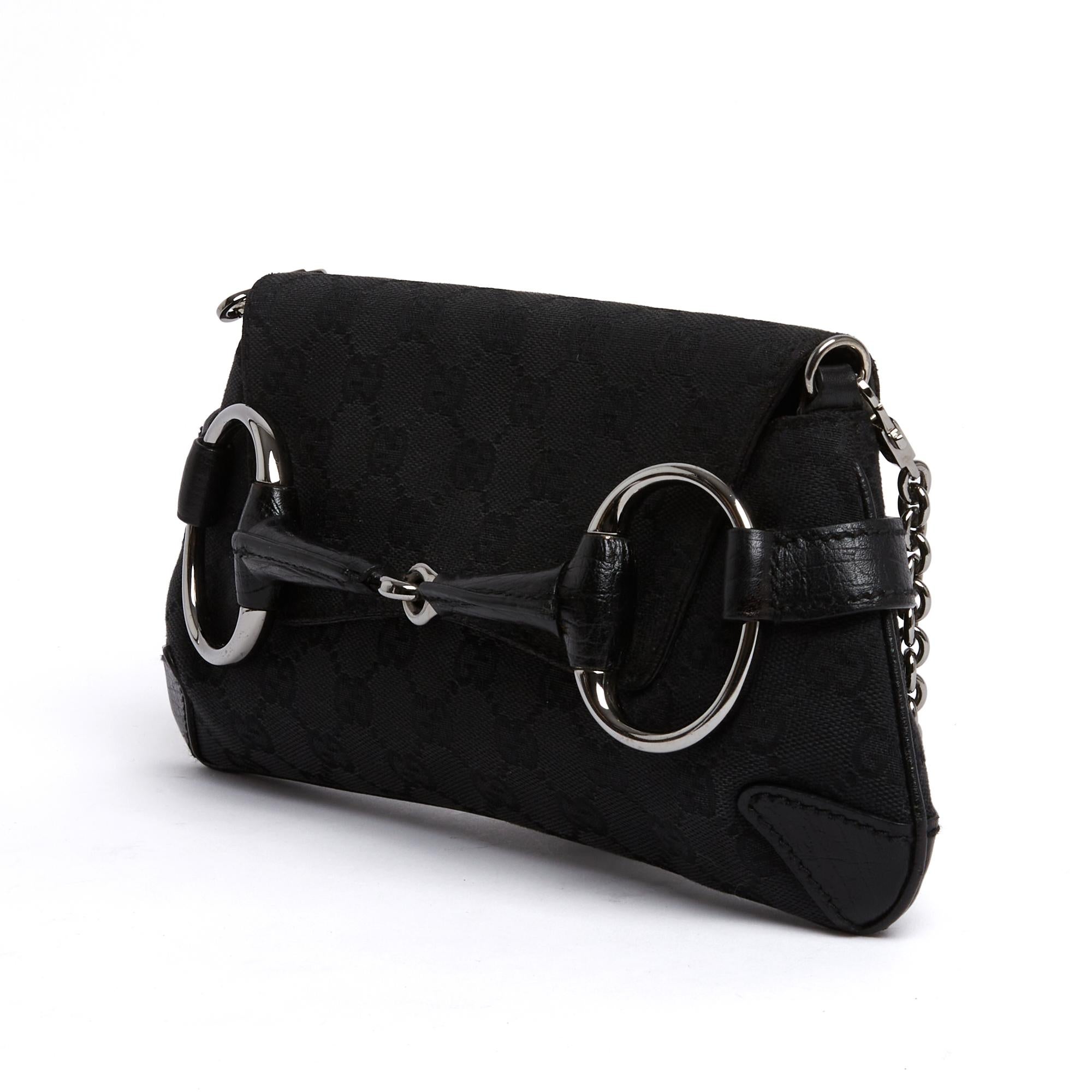 Gucci Sac Pochette Cadena Horsebit Negro GG Bolso de hombro de lona y cuero Clutc en Bueno estado para la venta en PARIS, FR