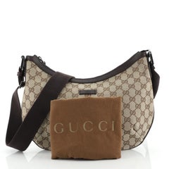 Sac de messager Gucci en toile GG medium avec fermeture éclair