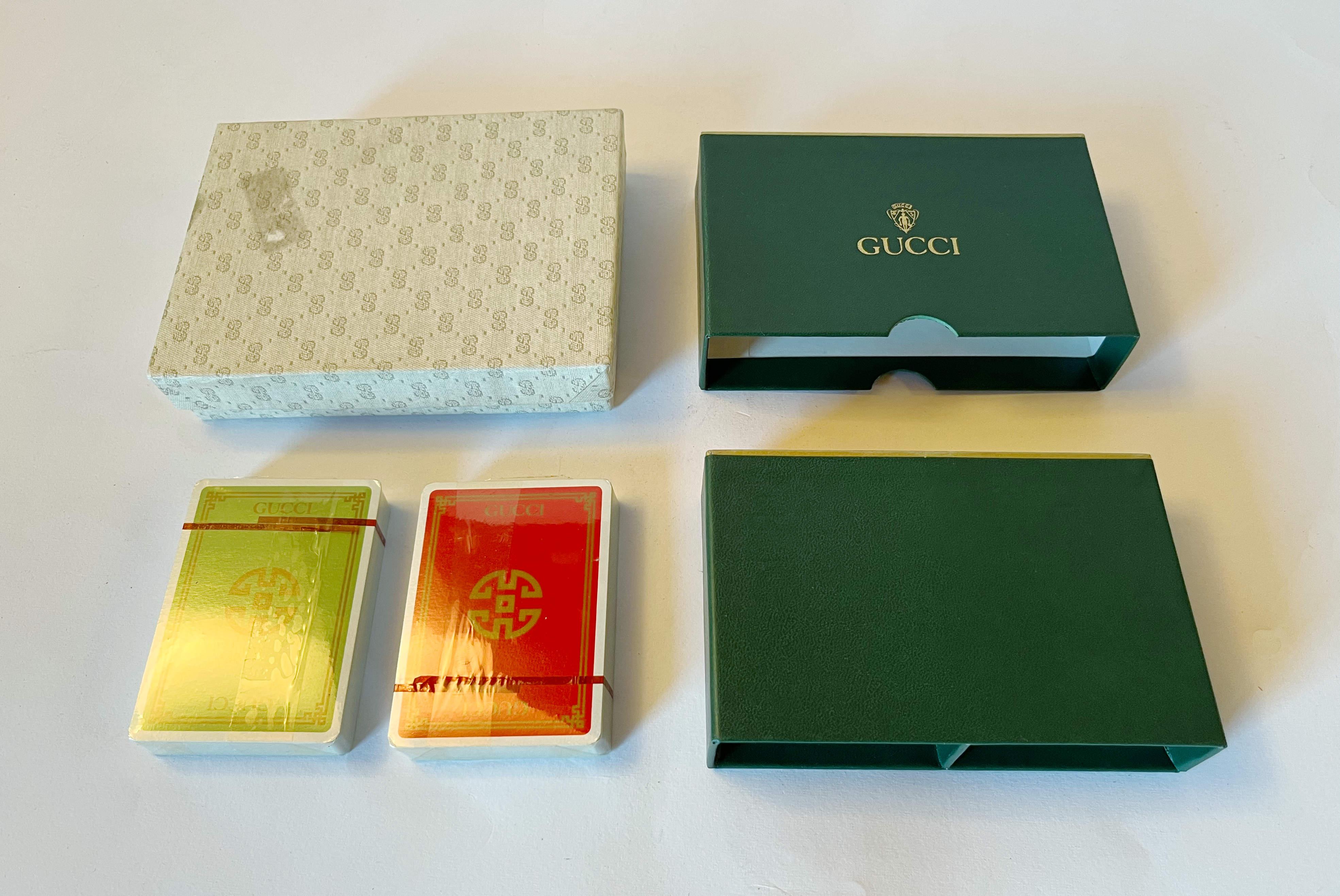 Rare Gucci vintage set of poker playing cards including 2 brand new decks of cards and original box / Made in Italy
Width: 6.5 inches / Depth: 5 inches / Height: 1.5 inches
1 set available in stock in Italy
Order reference #: FABIOLTD G047