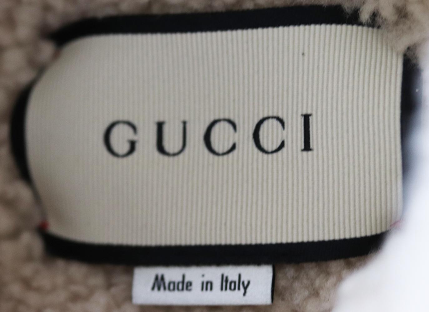 Gucci - Giacca di jeans con bordi in montone e applicazioni 1