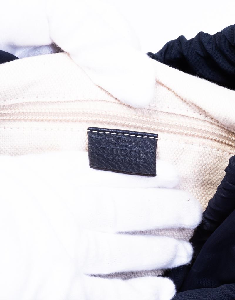 Signatur-Rucksack aus Kalbsleder von Gucci für Damen oder Herren im Angebot
