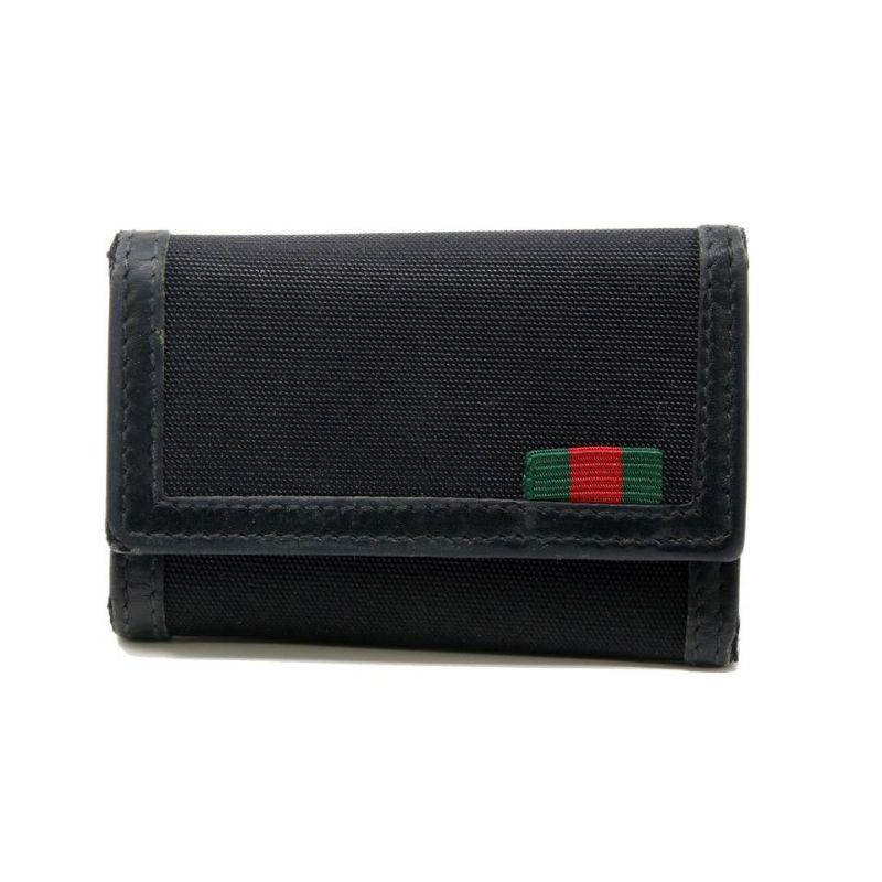 Gucci Signature Web Leather Nylon Six Ring Key Holder GG-1118P-0013

This classic Gucci Black Leather and Nylon Six Ring Key Holder will be your new favorite accessory. It features six key clasps to keep your keys organized in an elegant fashion.