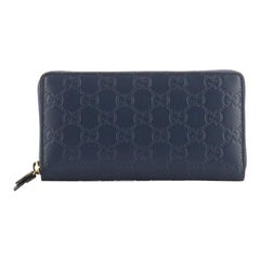 Gucci Signature Zip Around Wallet Guccissima Leather 