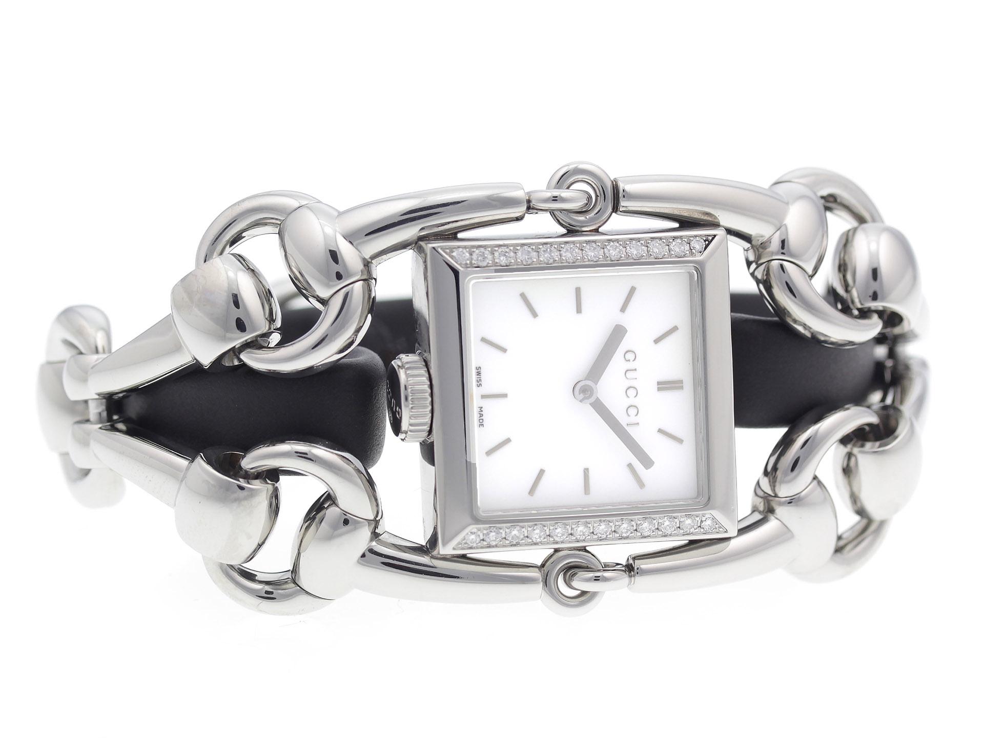 Stainless steel w/ diamonds Gucci Signoria YA116307 watch, water resistance to 30m.

Watch	
Brand:	Gucci
Series:	Signoria
Model #:	YA116307
Gender:	Ladies
Condition:	Excellent Condition Pre-owned, Small Dings & Scratches on Bracelet, Small Dings on