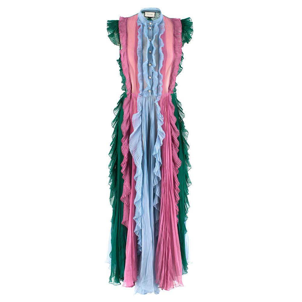 Gucci Silk Contrast Pleated Ruffle Shirt Dress

-Romantic, feminine frill detail 
-Side chest zip 
-Faux-pearl buttons embellished with GG 
-High-neck collar 
-Butterfly motif accented across the back
-Green, sky-blue and purple silk-crepe