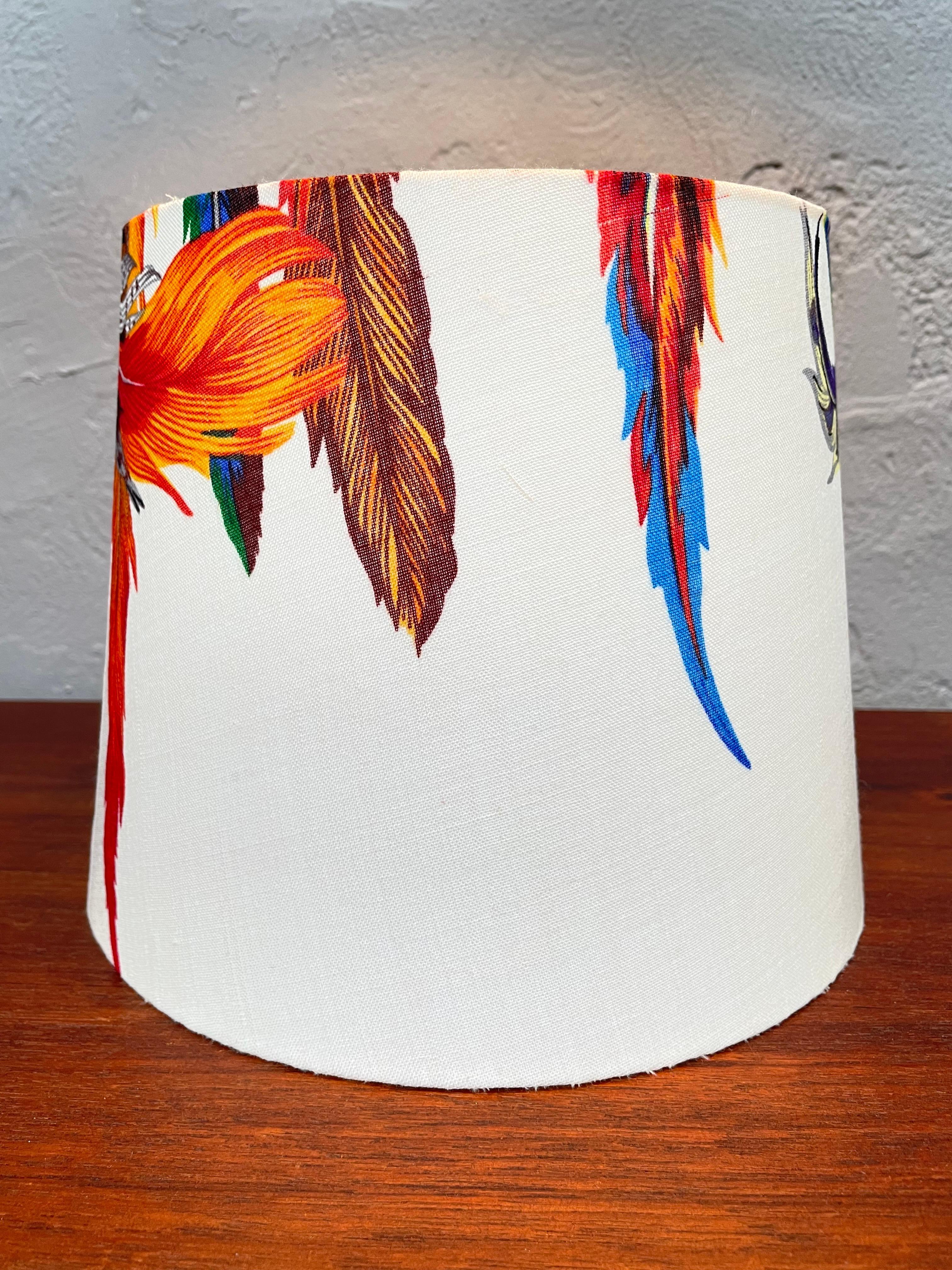 A stunning lampshade handmade from an original silk Gucci Indian tribal headdress scarf. 
With the Gucci print included on this shade. 
Stunning colors and with an iconic printed pattern this shade would fit into any household decor. 
And mounted