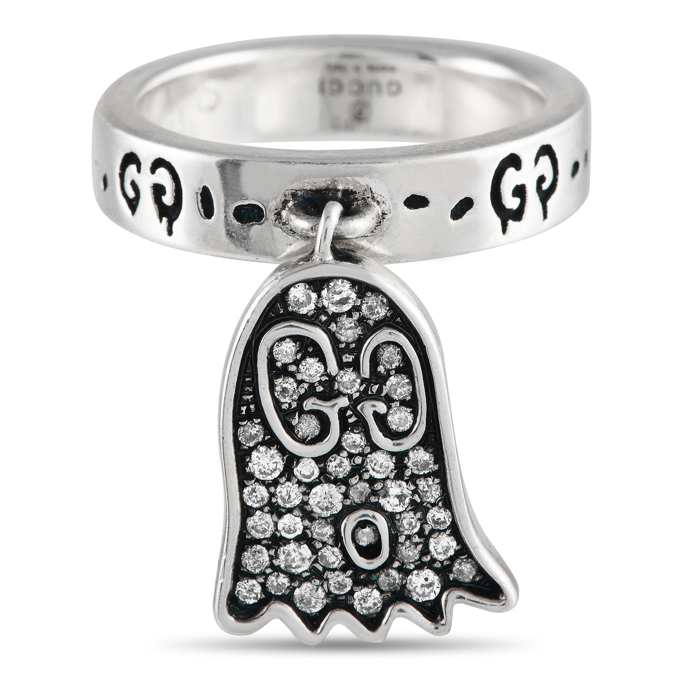 Add a spooky twist to your style with this Gucci ring. Designed in collaboration with Trouble Andrew, this 4mm-thick sterling silver ring has a GG-embossed band adorned with a dangling ghost charm with GG eyes and a Pacman-like silhouette. The