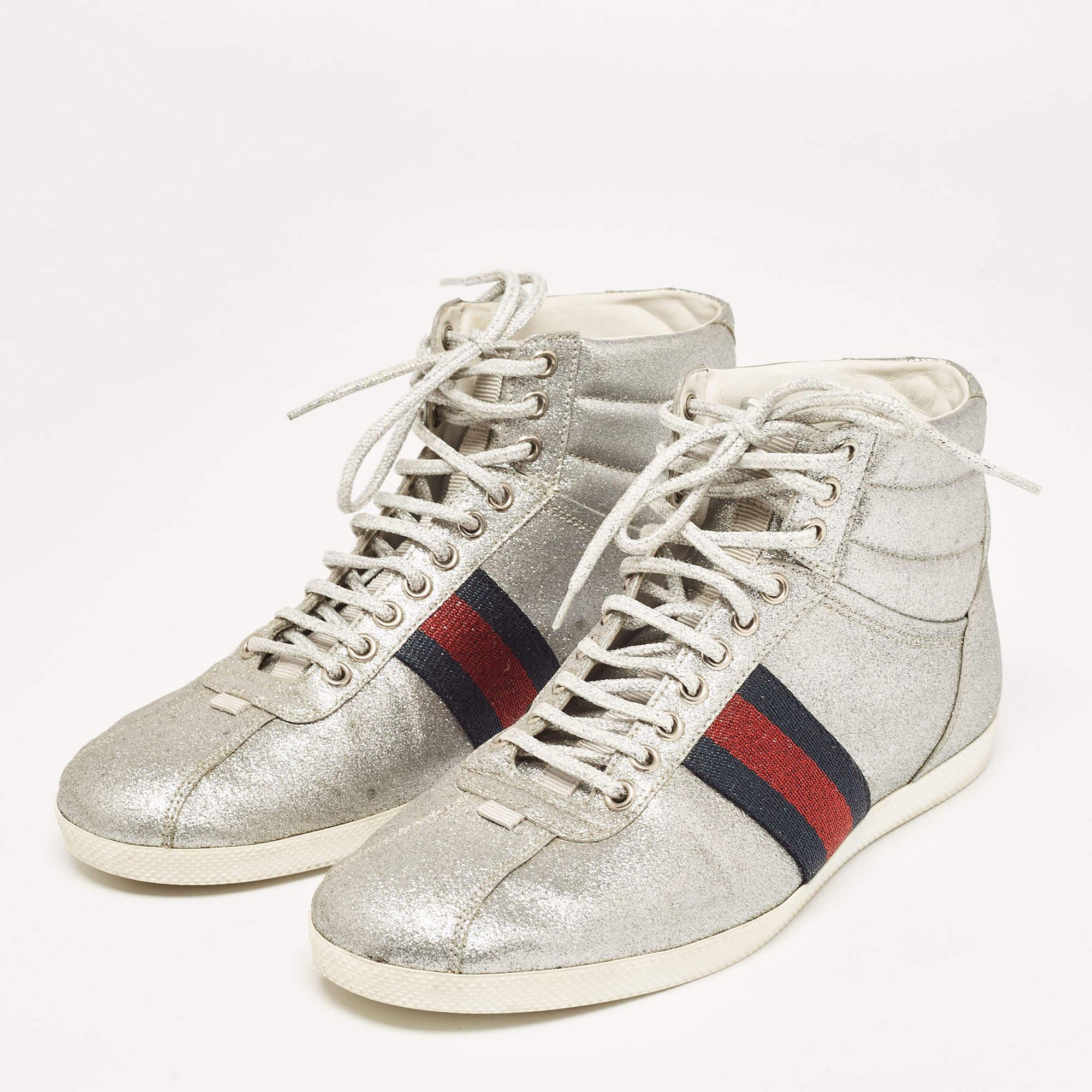 Packed with style and comfort, these Gucci sneakers are gentle on the feet so that you can glide through the day. They have a sleek upper with lace closure, and they're set on durable rubber soles.

Includes: Original Dustbag, Original Box