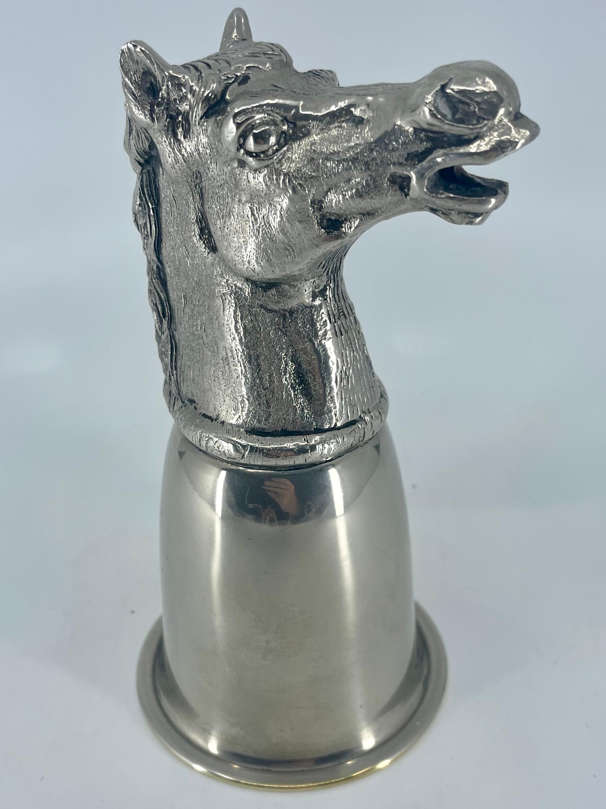 Gucci silver horse stirrup cup. Vintage Italian silverplate horse head stirrup cup with gold wash to interior of cup with stamps for Gucci and Italy, and with “Victory” engraved in Italian to one side; a fitting trophy for your winning Amazone or