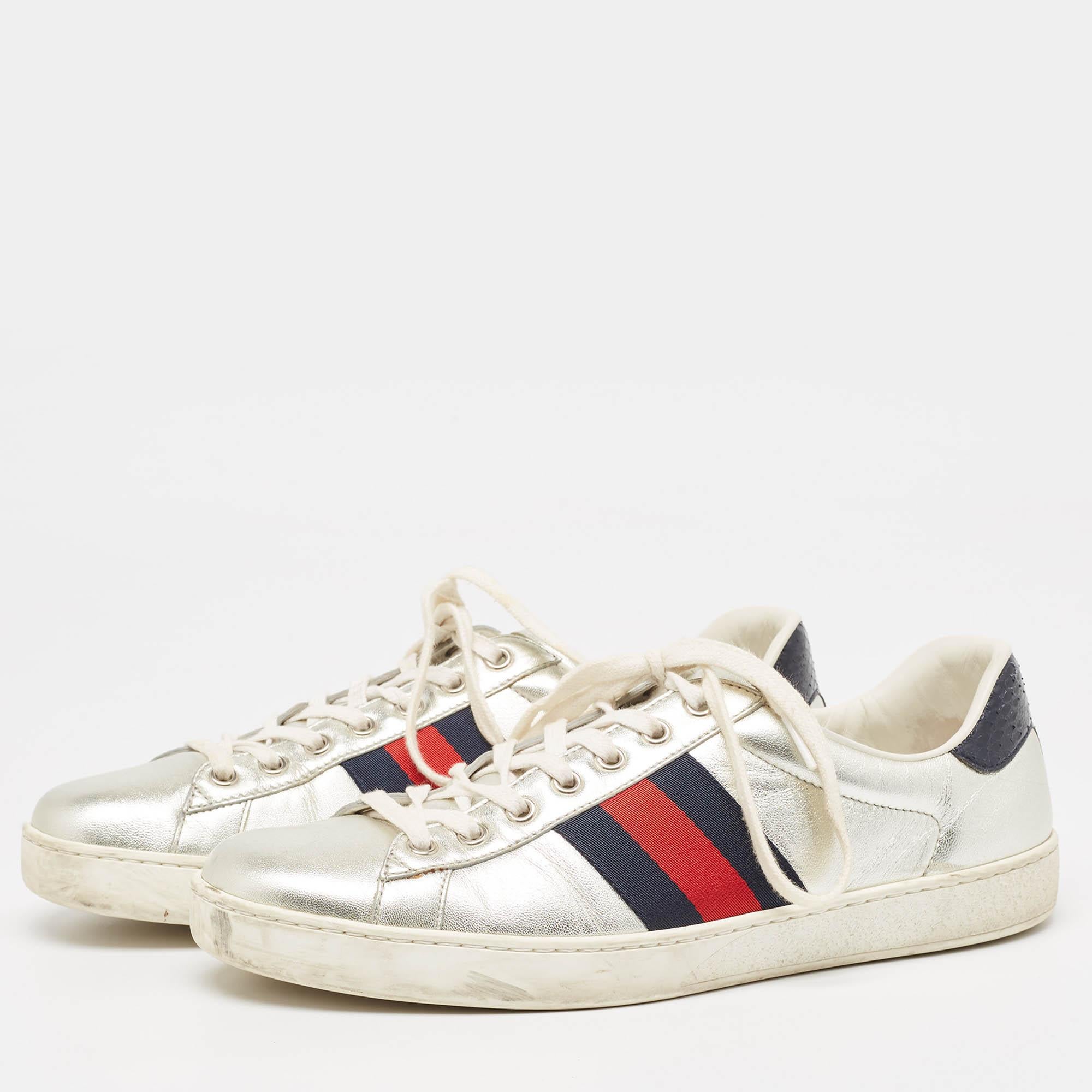 Stacked with signature details this Gucci pair is rendered in leather and is designed with lace up vamps rubber soles and the iconic Web stripe. The visual display of this pair is enhanced with contrasting color trims carrying the brand label on the