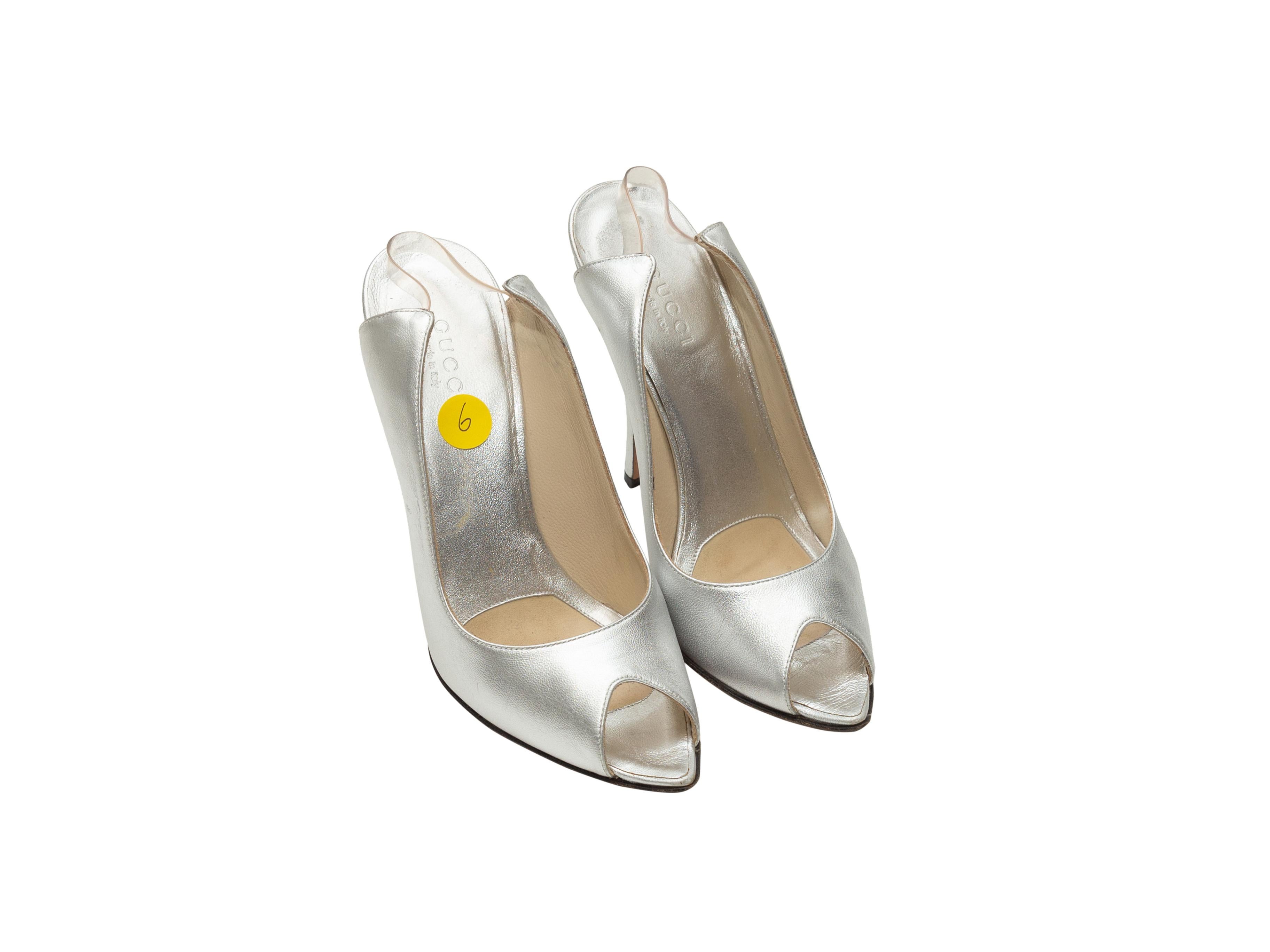 Product details: Silver metallic leather peep-toe pumps by Gucci. Clear slingback straps. Designer size 36. 4