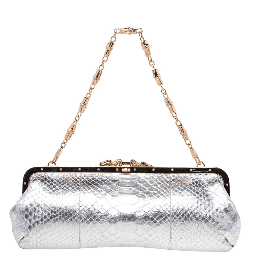 One look at this bag from Gucci and you'll know right away why it is luxury. It is not only high in style but magnificent in appeal as well. Crafted from python-embossed leather and equipped with a satin interior, this piece is held by a chain-link