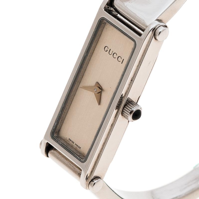 Coming from the house of Gucci, this 1500L wristwatch is designed in a stainless steel body with a case diameter of 12mm. It comes fitted with a sleek rectangular dial detailed with dauphine hands. Powered by quartz movement, this watch comes with a