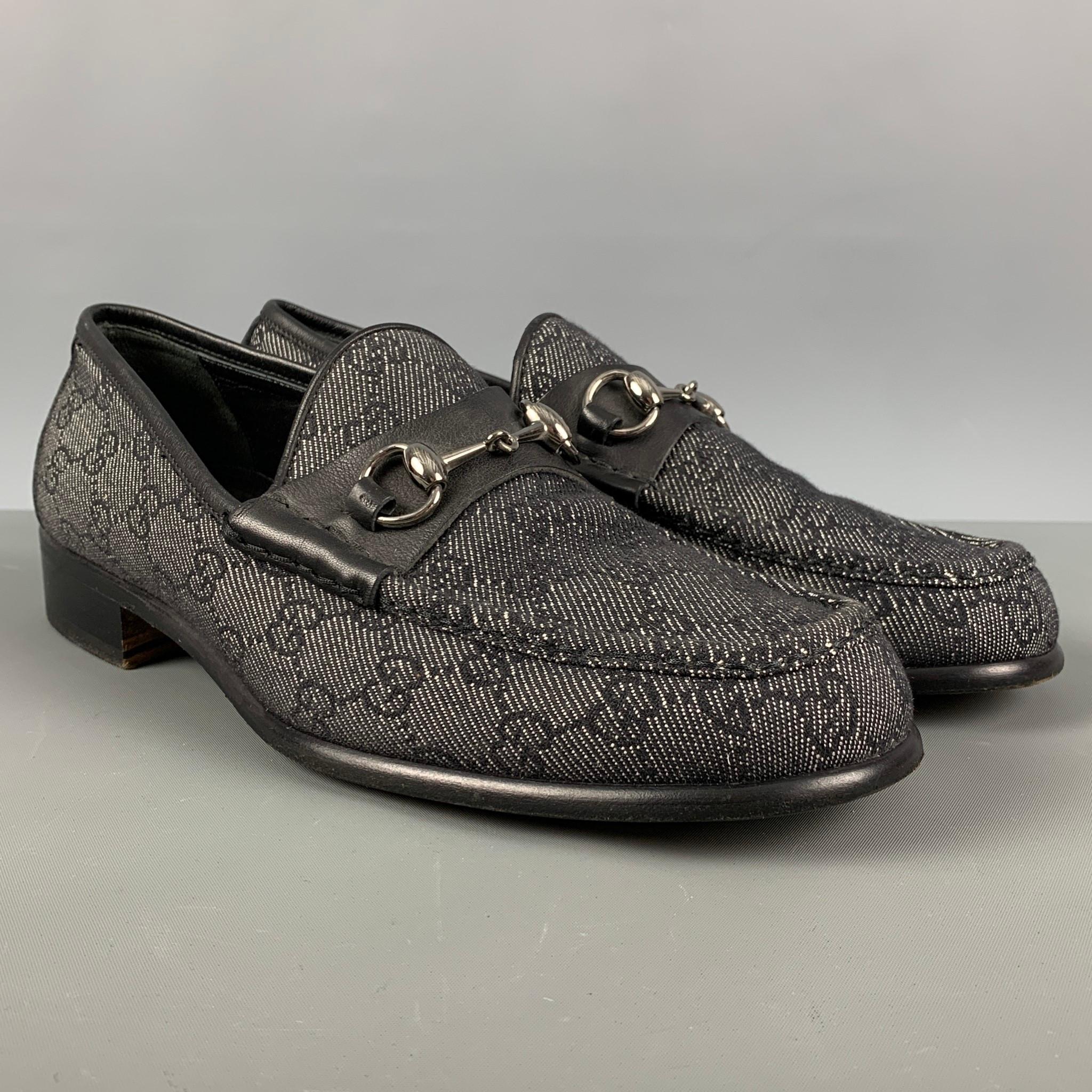 GUCCI loafers comes in a black GG monogram canvas featuring a silver hardware, and a slip on style. Made in Italy.

Excellent Pre-Owned Condition.
Marked: 015940 91/2 D

Outsole: 11.5 in x 4 in.    

SKU: 124644
Category: Loafers

More