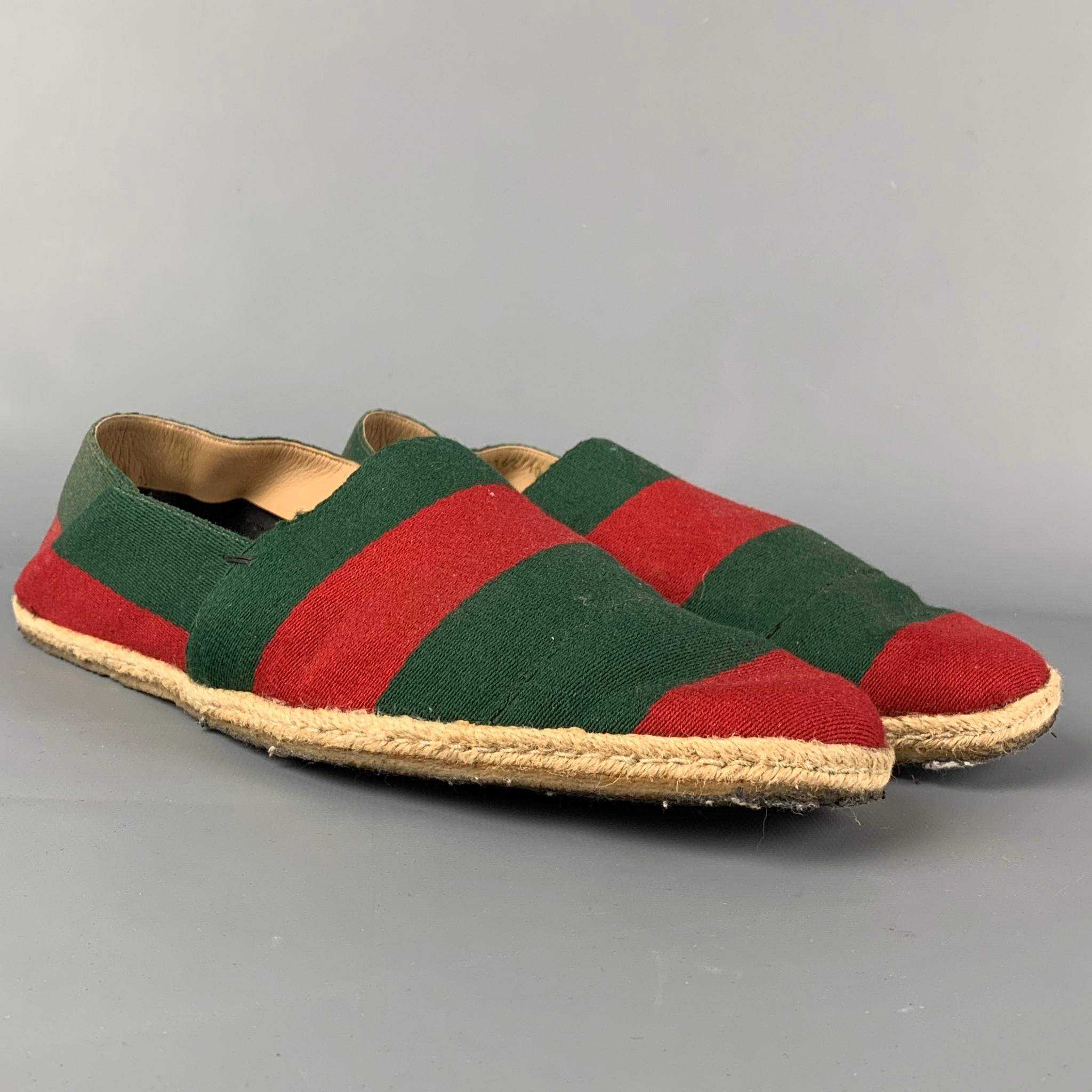 GUCCI loafers comes in a green & red stripe canvas featuring slip on style and a espadrille sole. Made in Italy. 

Good Pre-Owned Condition.
Marked: 122462 10 D

Outsole: 12 in. x 4.25 in. 