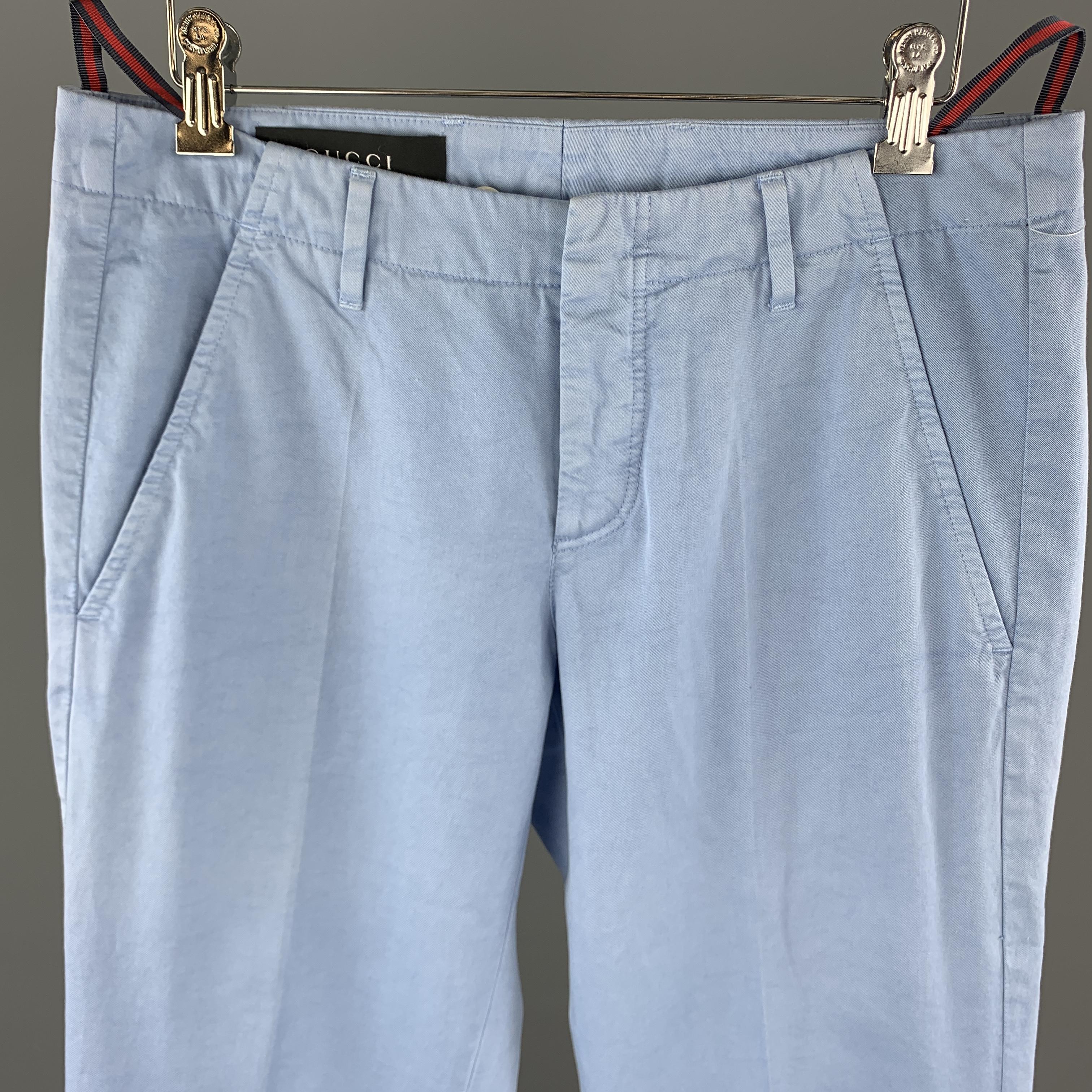 GUCCI chino pants come in light blue cotton twill with a low rise button fly front and inner waistband brace buttons. Made in Italy.

Good Pre-Owned Condition.
Marked: IT 44

Measurements:

Waist: 31.5 in.
Rise: 8.75 in.
Inseam: 30 in.