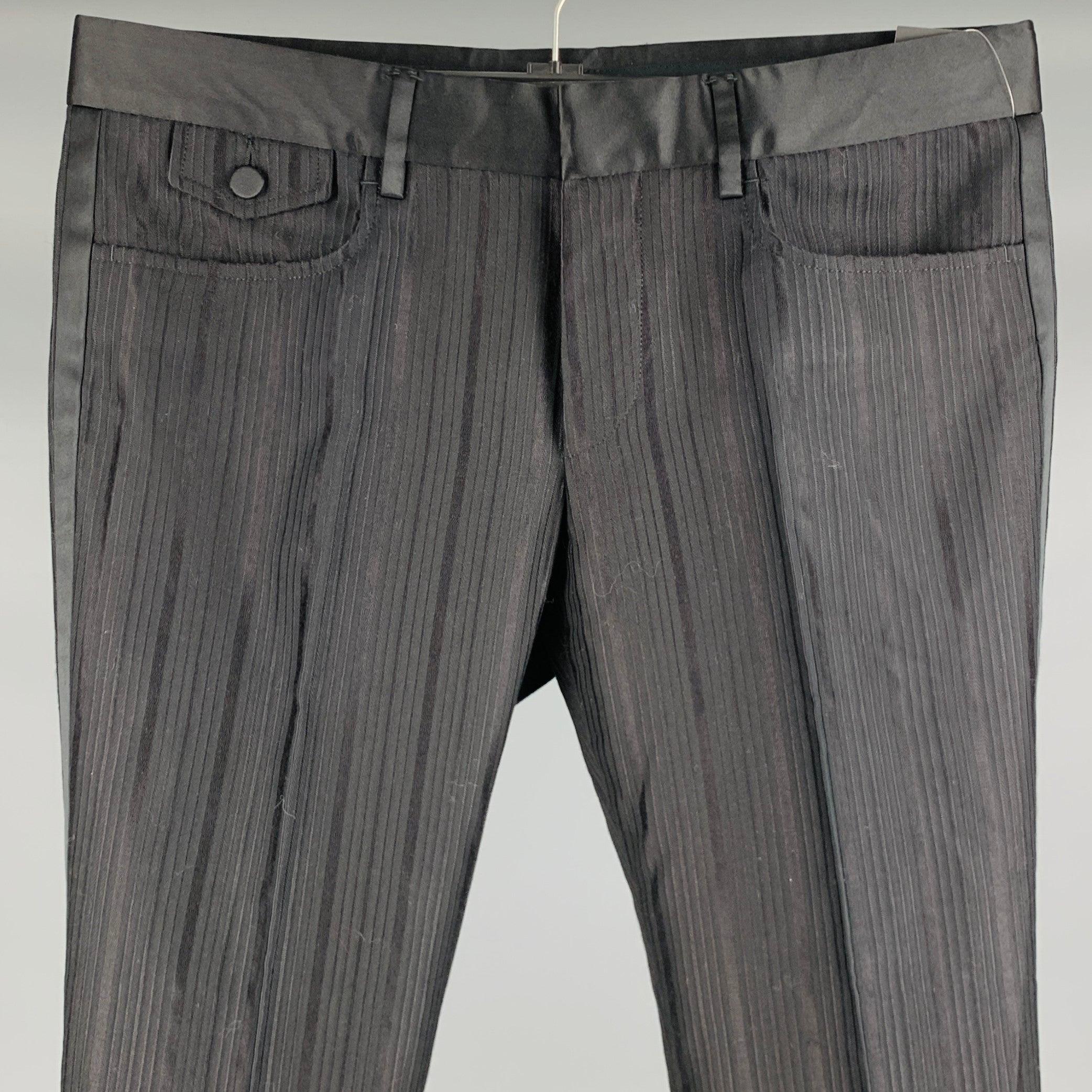 GUCCI x TOM FORD dress pants
in a
black cotton silk blend fabric featuring vertical stripe pattern, tuxedo side stripes, and button closure. Made in Italy.Excellent Pre-Owned Condition. 

Marked:   48R 

Measurements: 
  Waist: 32 inches Rise: 7