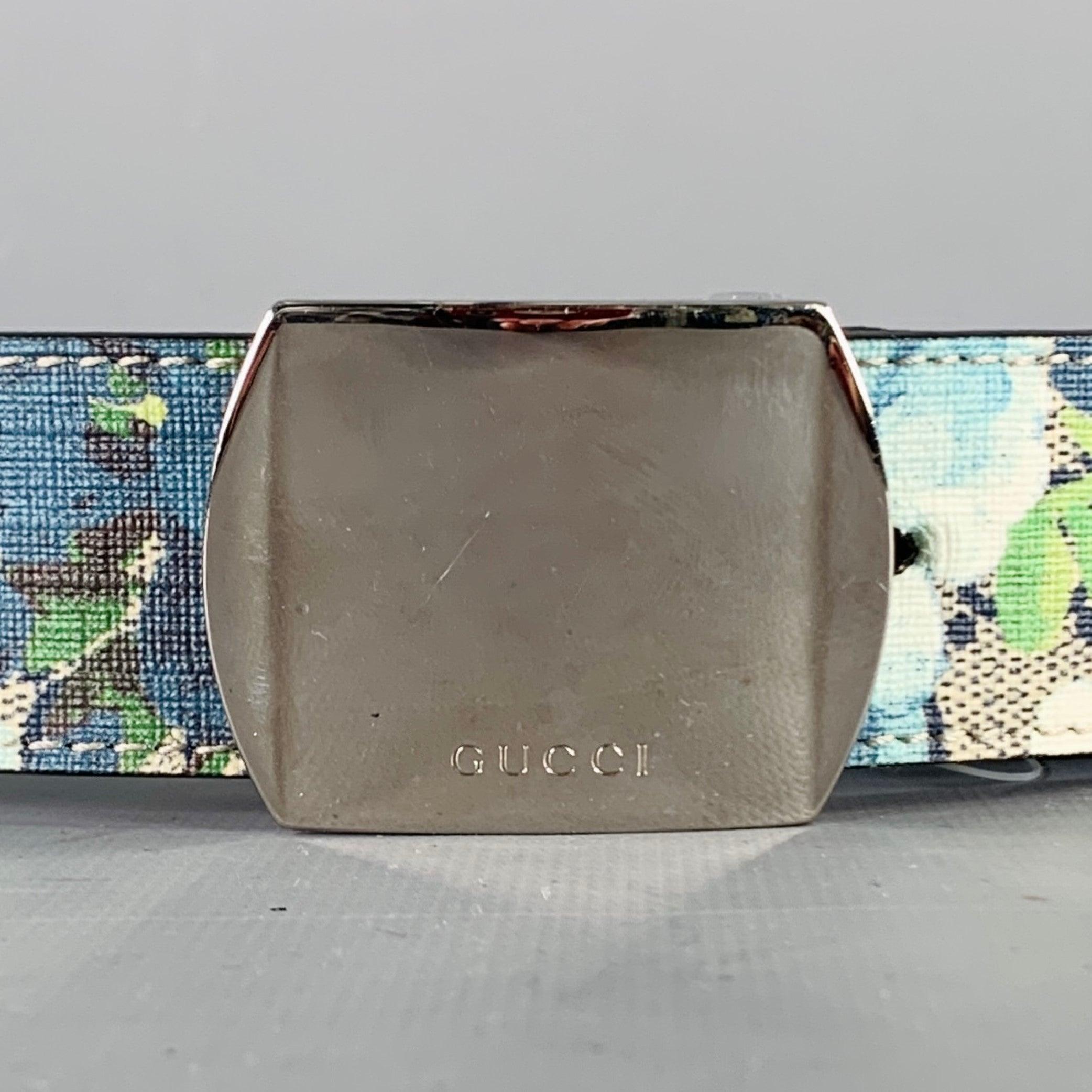 GUCCI belt in a blue & white floral monogram print leather featuring a silver tone buckle closure. Made in Italy. Very Good Pre-Owned Condition. 

Marked:   546375 KU2HN 85 34 480199Length: 39.25 inches Width: 1.25 inches Fits: 32 inches  - 36