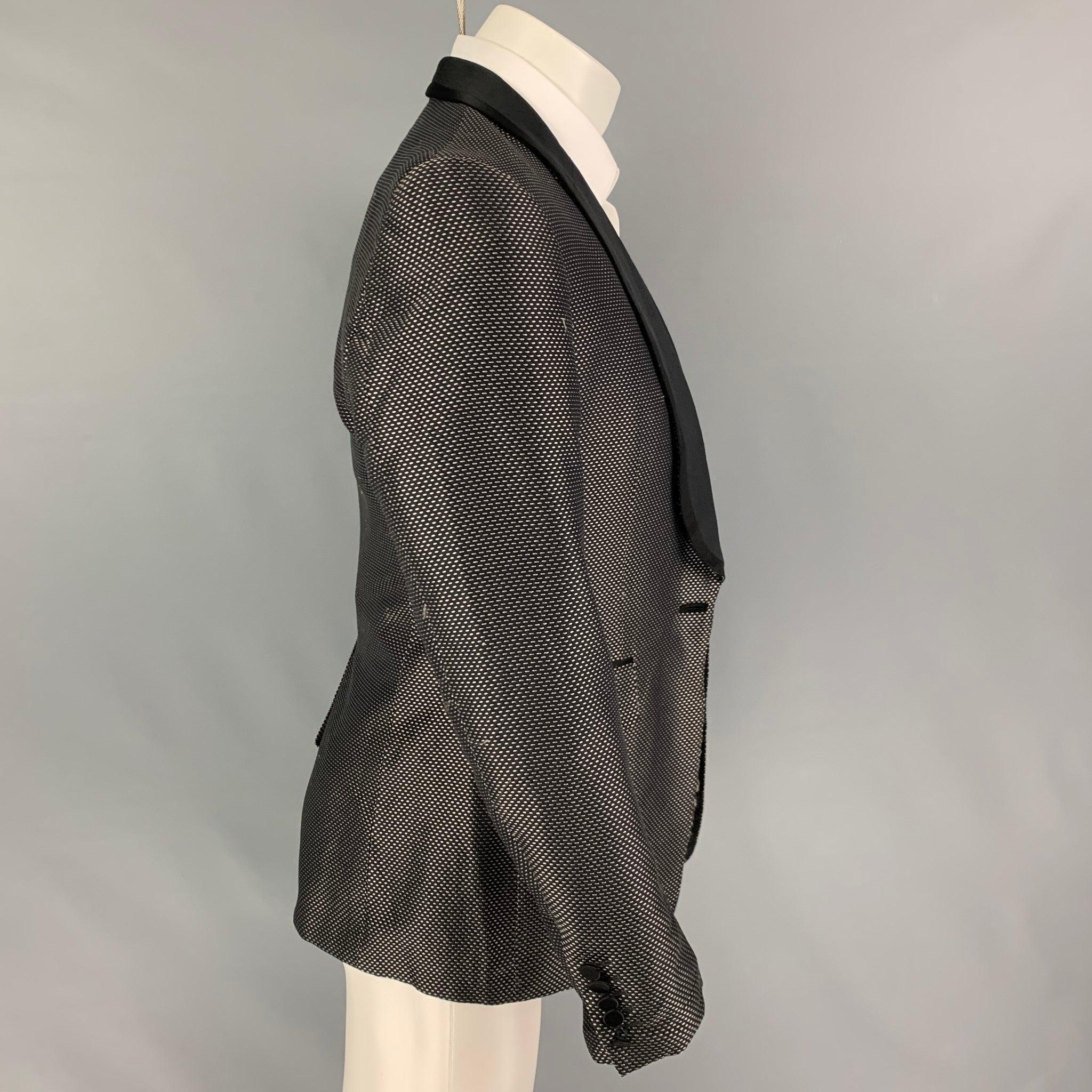 GUCCI
 sport coat comes in a grey & black textured rayon blend with a full liner featuring a shawl collar, flap pockets, single back vent, and a single button closure.Good Pre-Owned Condition. Missing button. As-is.  
 

 Marked:  50 R  
 

