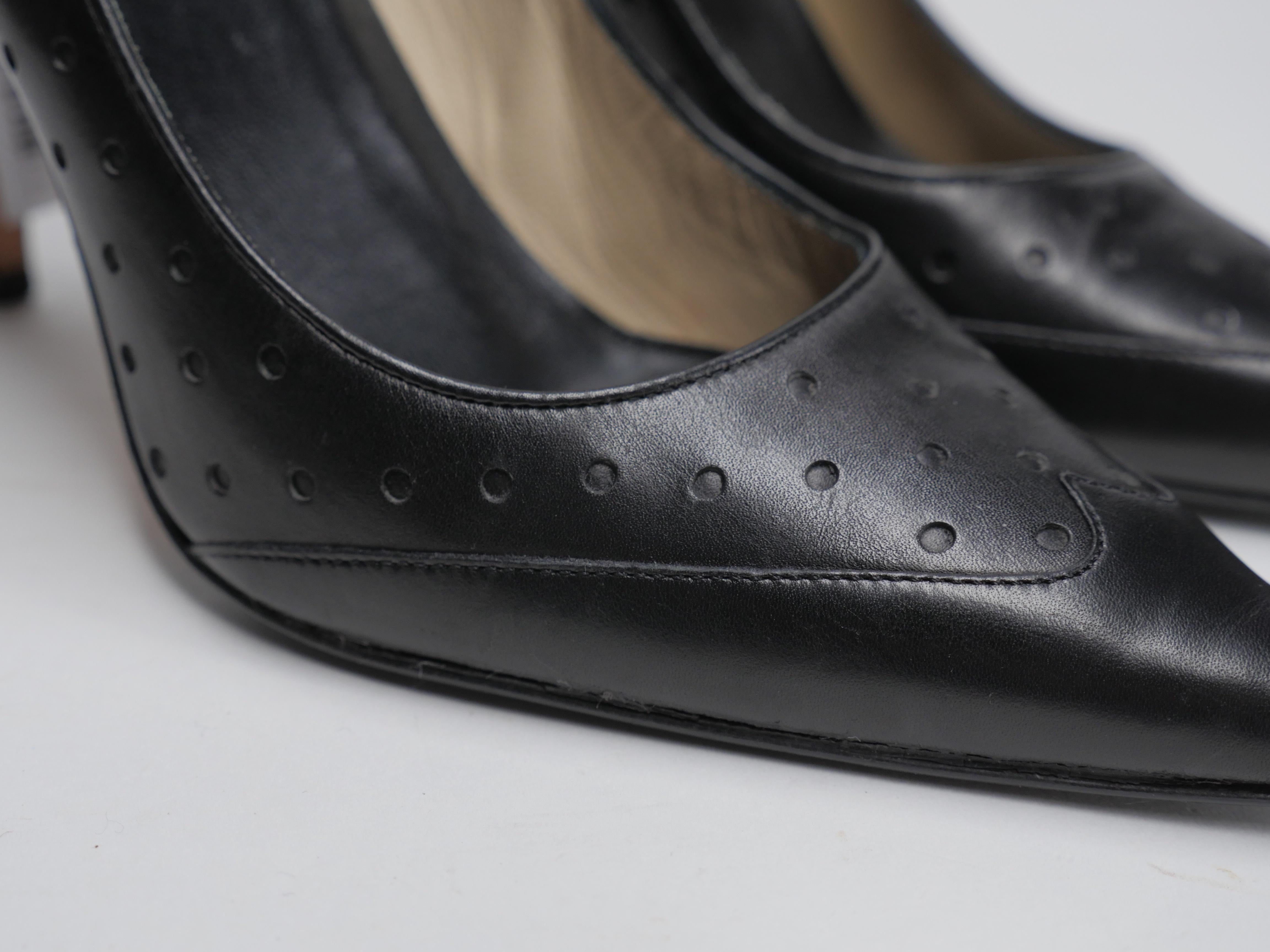 Gucci Size 6.5 Black Leather Perforated Pumps 1