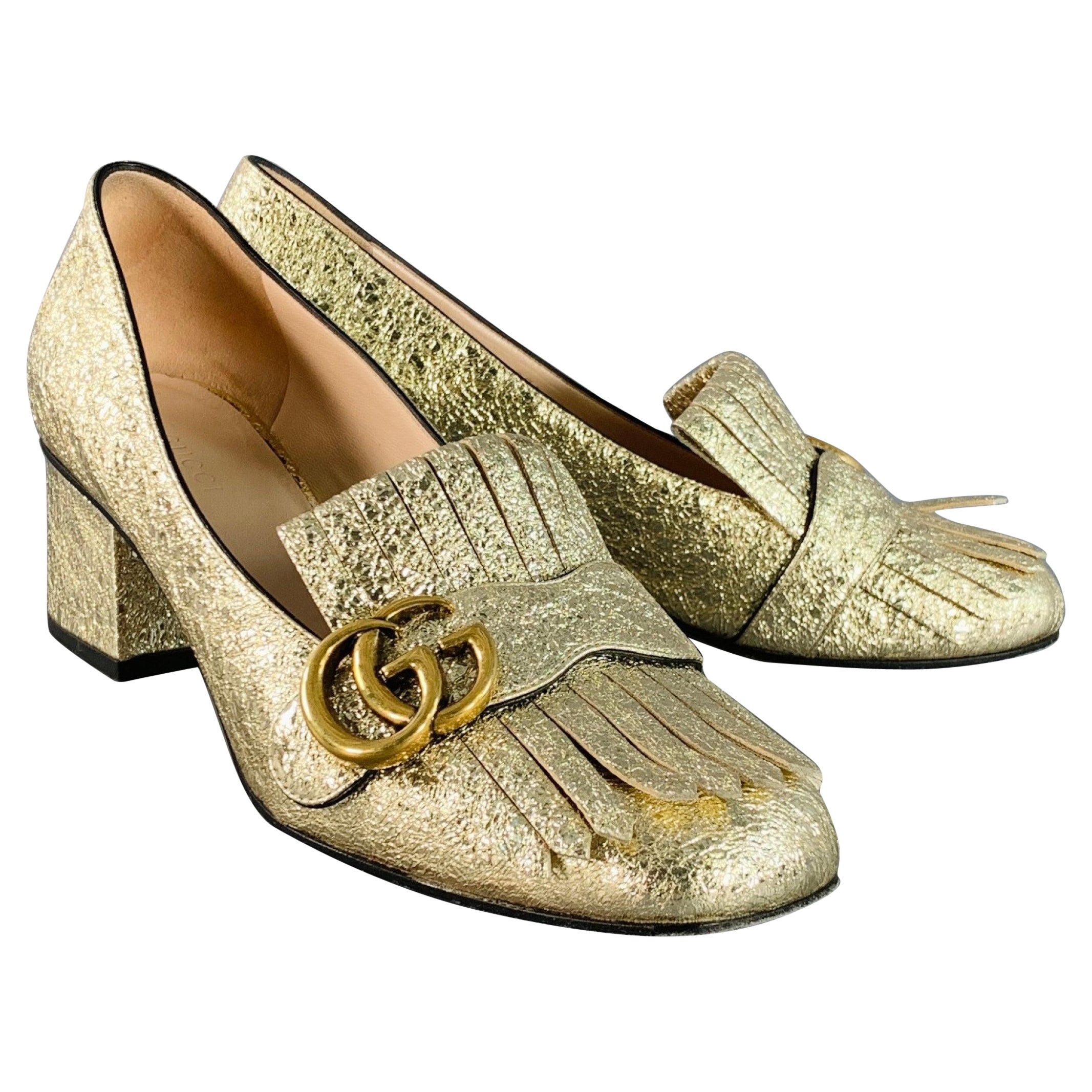 GUCCI Bombas con flecos de pestañas en piel dorada metalizada talla 7.5