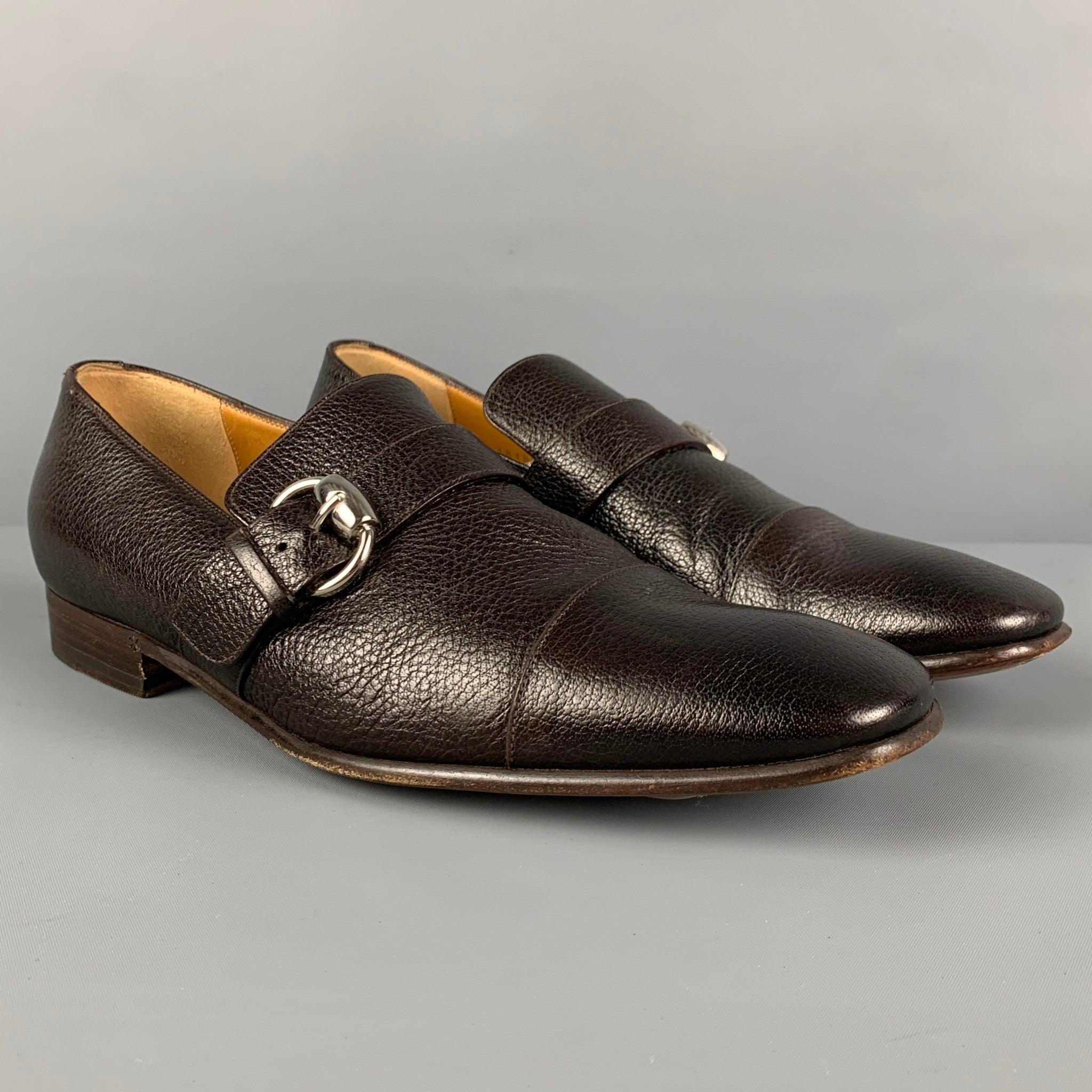 GUCCI loafers comes in a brown pebble grain leather featuring a square toe and a silver tone buckle. Made in Italy.
Very Good
Pre-Owned Condition. 

Marked:   7.5 Outsole: 11.5 inches  x 3.5 inches 
  
  
 
Reference: 117544
Category: Loafers
More