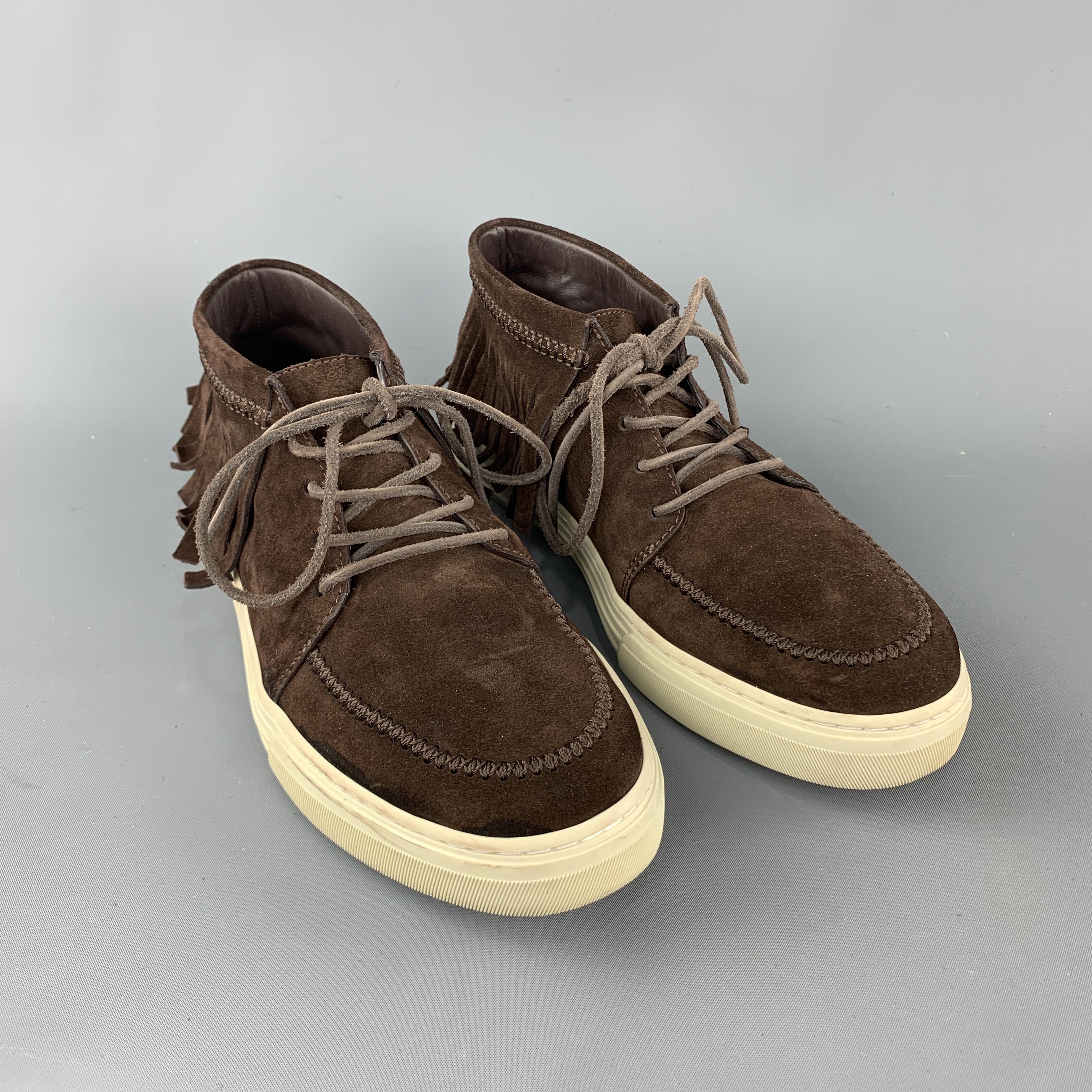 GUCCI sneaker comes in a brown suede featuring a lace up style, fringe detail, and a rubber sole. Made in Italy.
 
Very Good Pre-Owned Condition.
Marked: 7
 
Measurements:
 
Outsole: 11.5 in. x 4.5 in.