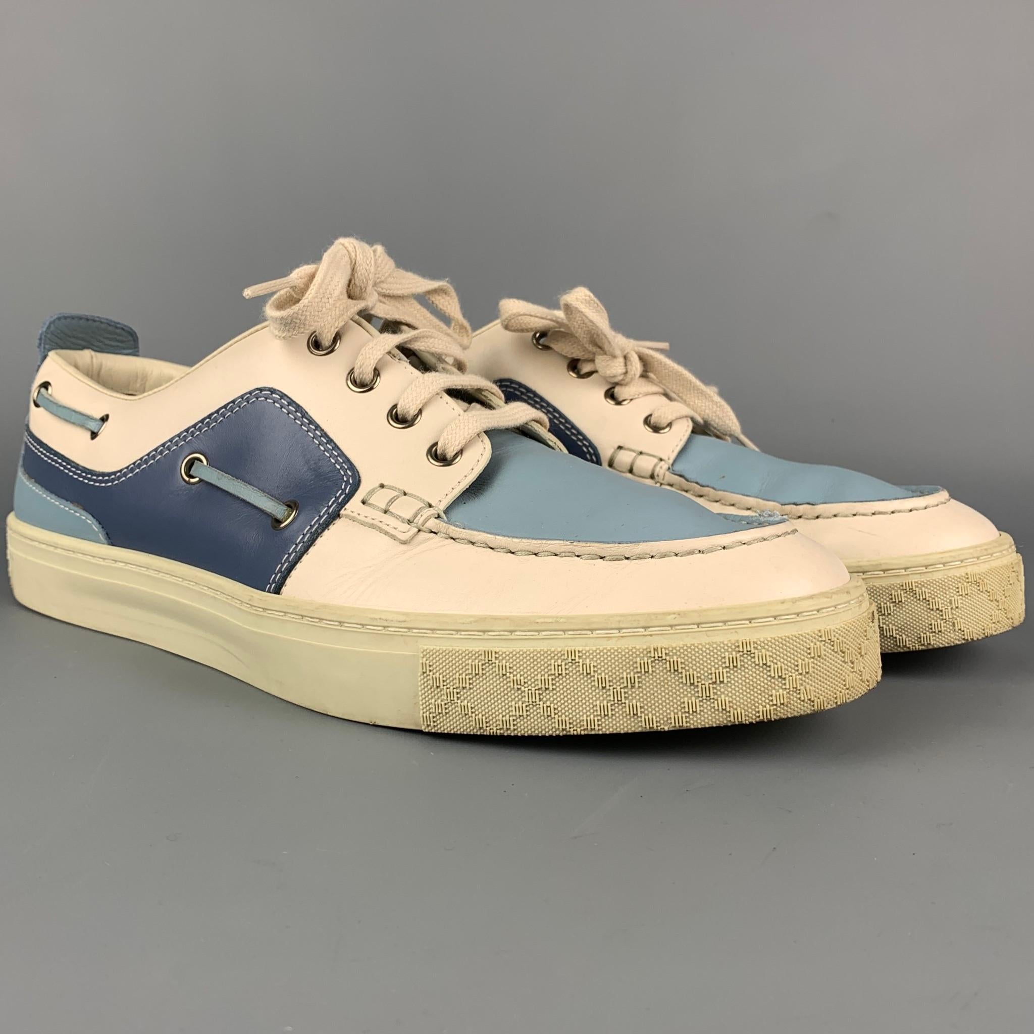 GUCCI sneakers comes in a blue & beige color black leather featuring a boat style, silver tone hardware, rubber sole, and a lace up closure. Made in Italy. 

Good Pre-Owned Condition. Minor wear throughout.
Marked: 308236 8 G
Original Retail Price: