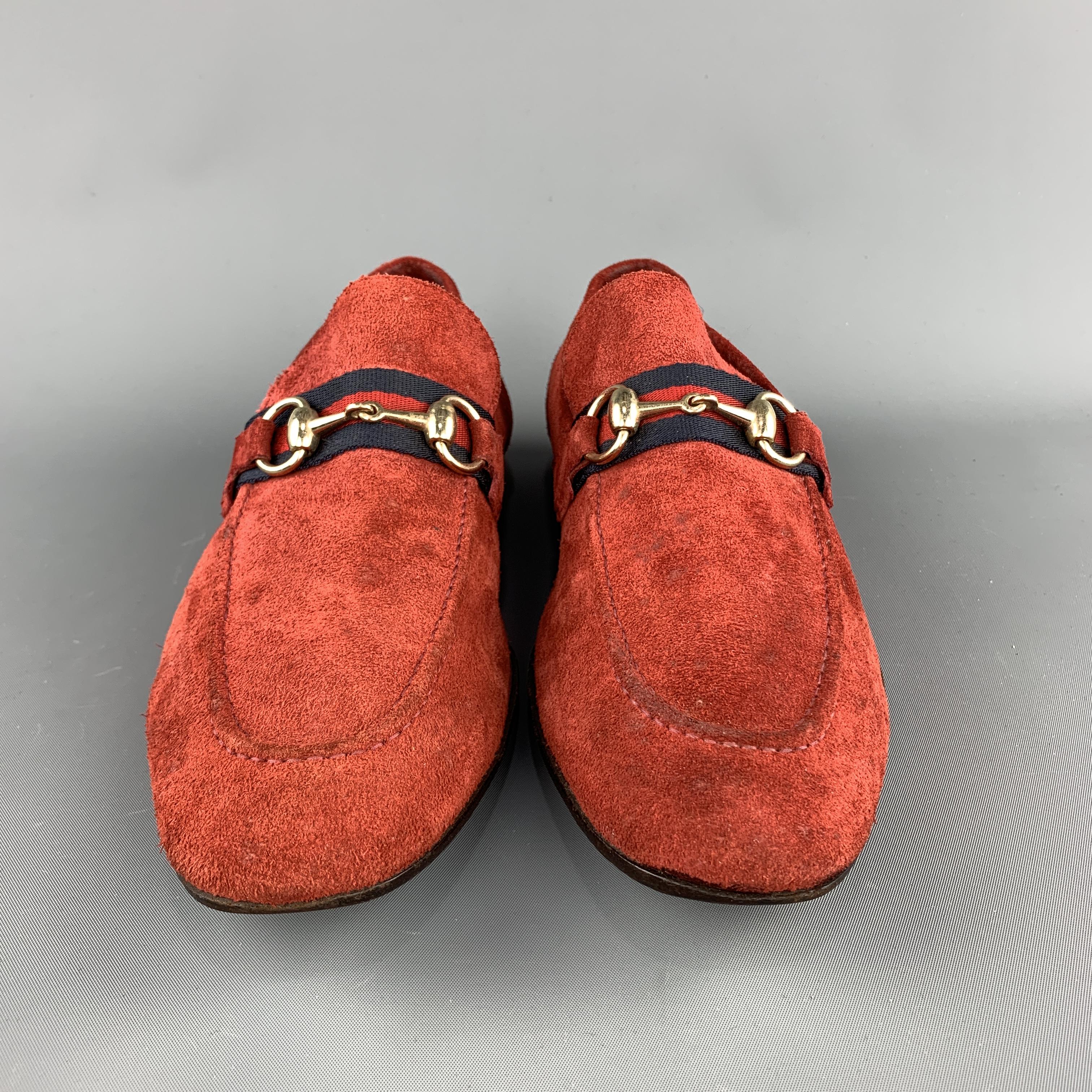 GUCCI loafer comes in a brick suede featuring a classic horsebit style, slip on, and a wooden sole and heel. (As-Is). Made in Italy.
 
Good Pre-Owned Condition.
Marked: 8
 
Measurements:
 
Outsole: 11.5 in. x 4.25 in.