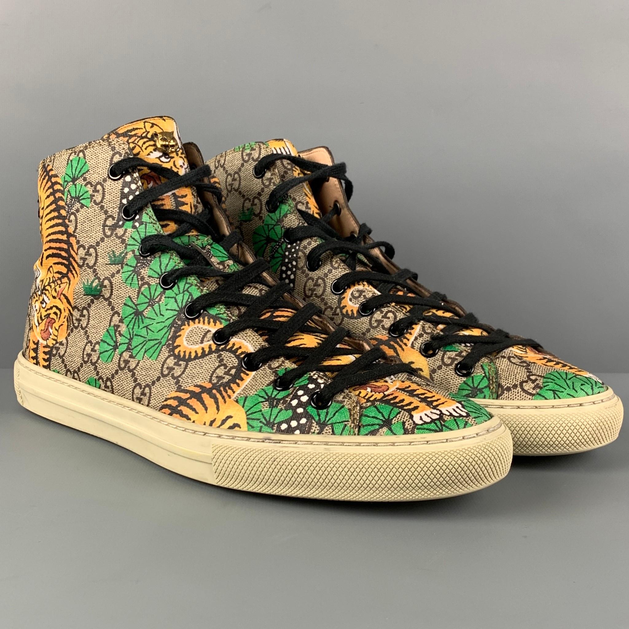 GUCCI 'Bengal Tiger GG' sneakers comes in a brown & green monogram coated canvas featuring a high-top style, rubber sole, and a lace up closure. Made in Italy. 

Very Good Pre-Owned Condition.
Marked: 9 G

Outsole: 11.5 in. x 4 in. 