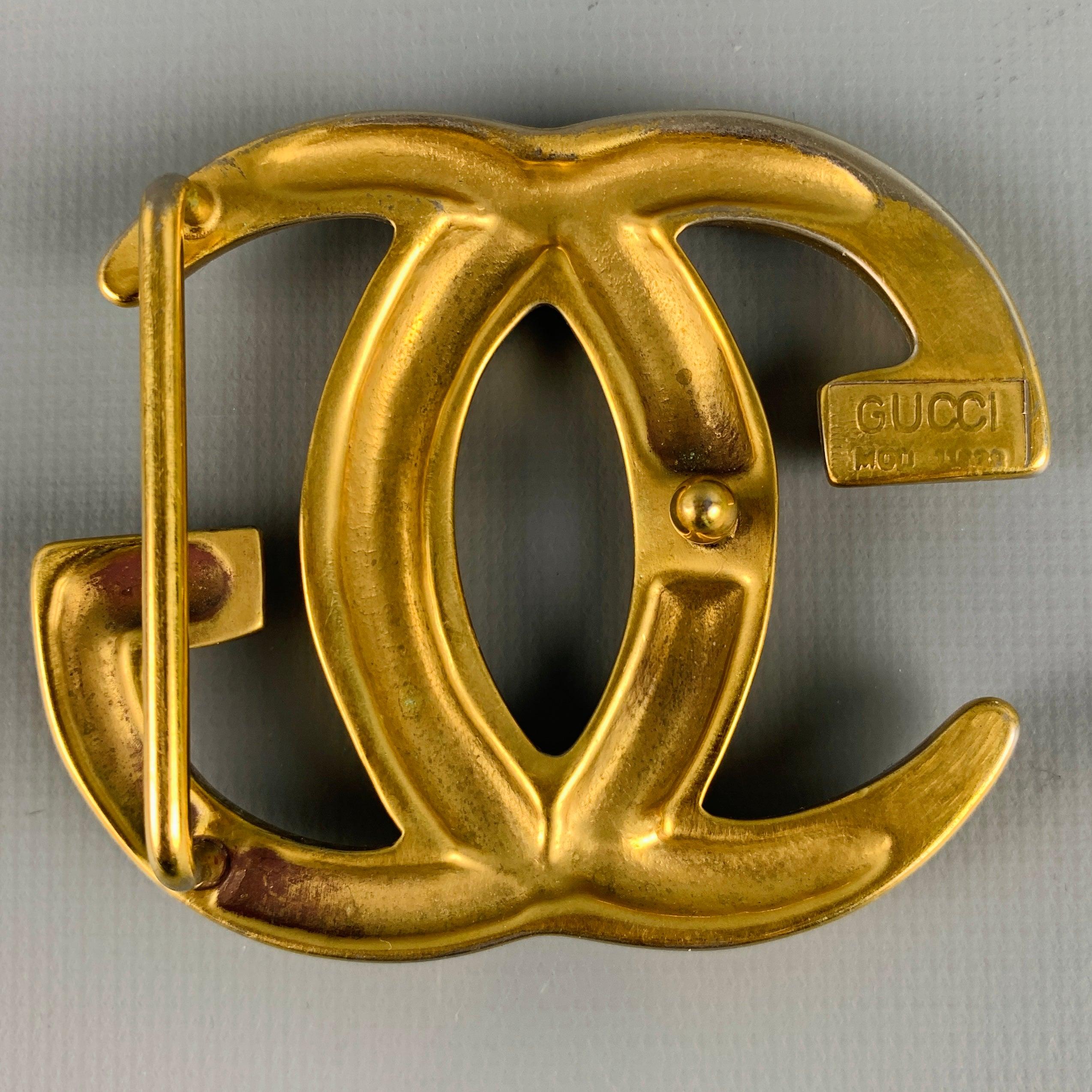 GUCCI
belt buckle in a gold tone metal featuring GG monogram, and belt loop. Made in Italy.Very Good Pre-Owned Condition. Minor signs of wear. 

Measurements: 
  9.5 cm. x 8.5 cm.
  
  
 
Sui Generis Reference: 129566
Category: Belt Buckle
More