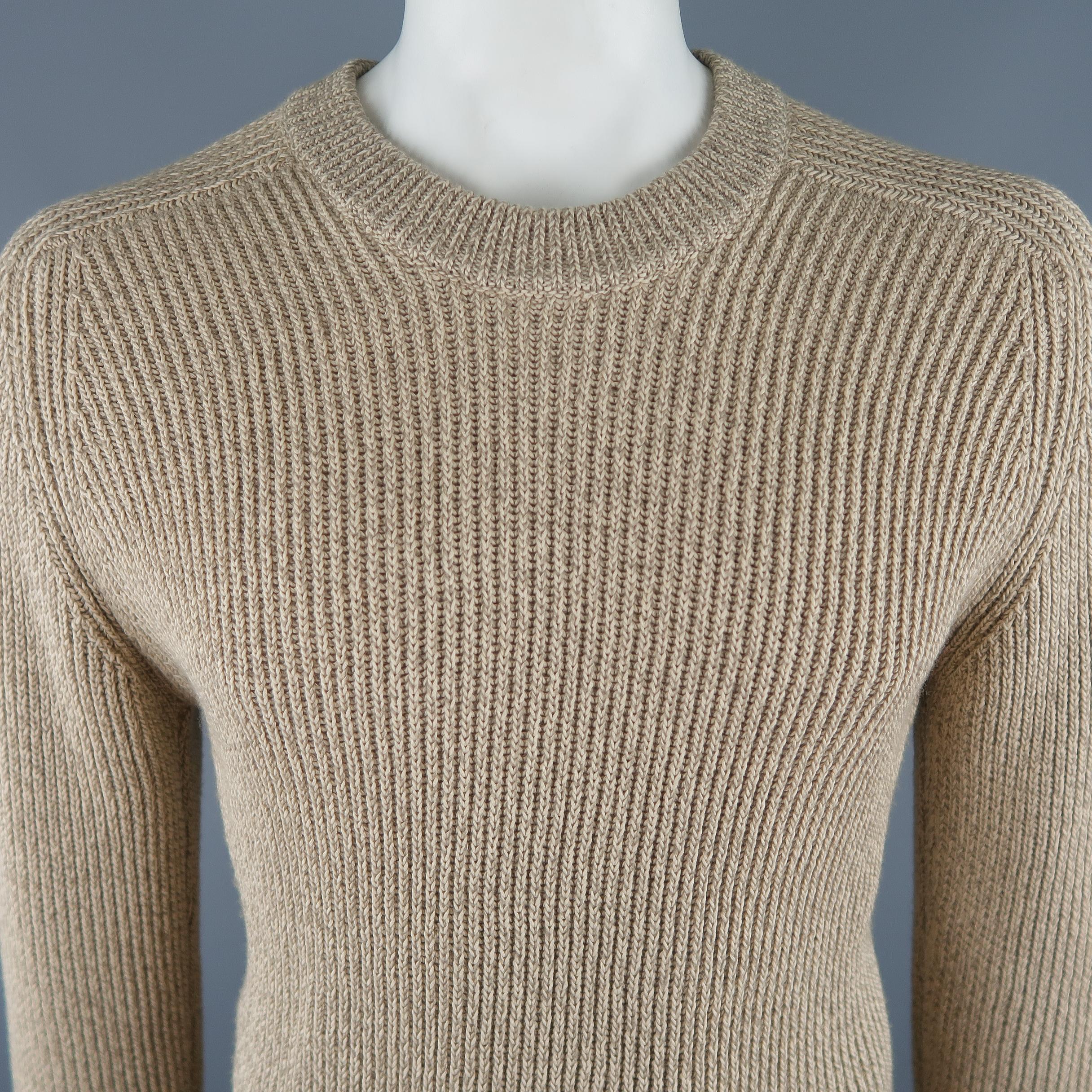 GUCCI Pullover Sweater comes in an oatmeal tone in a ribbed knit cotton material, with a crewneck. Made in Italy.
 
New With Tags.
Marked: M
 
Measurements:
 
Shoulder: 17.5 in.
Chest: 40 in.
Sleeve: 30 in.
Length: 30.5 in.