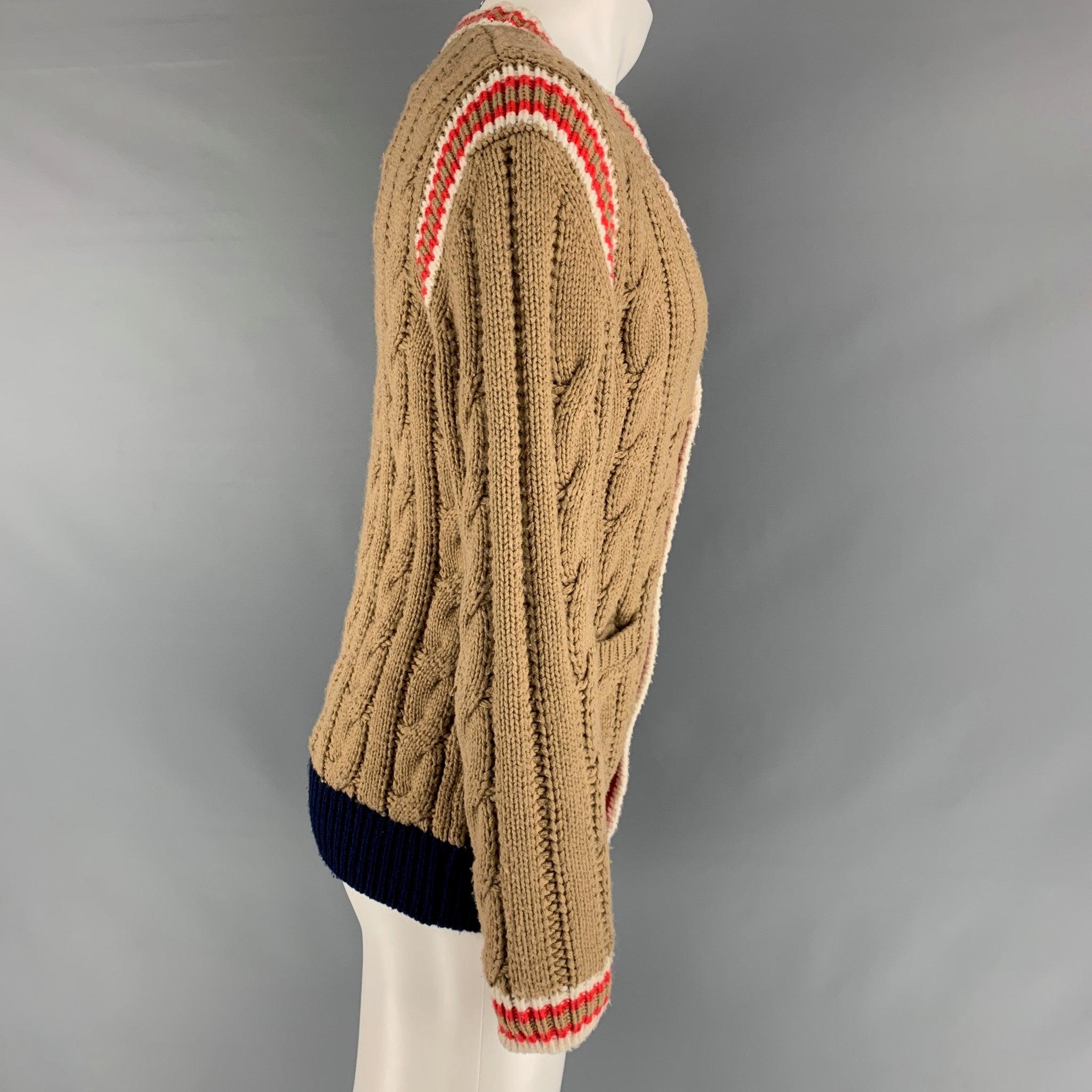 GUCCI cardigan comes in a brown wool knit material featuring V-neck, coral details, cable knit, and a buttoned closure. Made in Italy.Good Pre-Owned Condition. Moderate signs of wear. As Is. 

Marked:   S 

Measurements: 
 
Shoulder: 18 inches