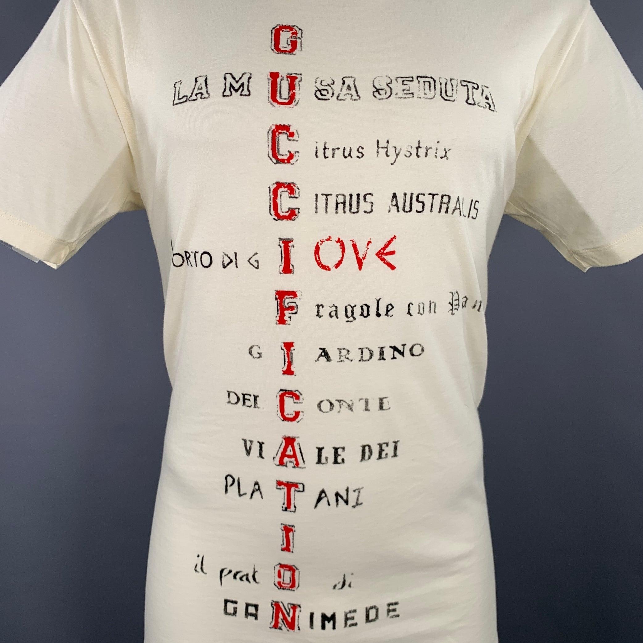 GUCCI t-shirt
in a cream jersey fabric featuring a red and black 