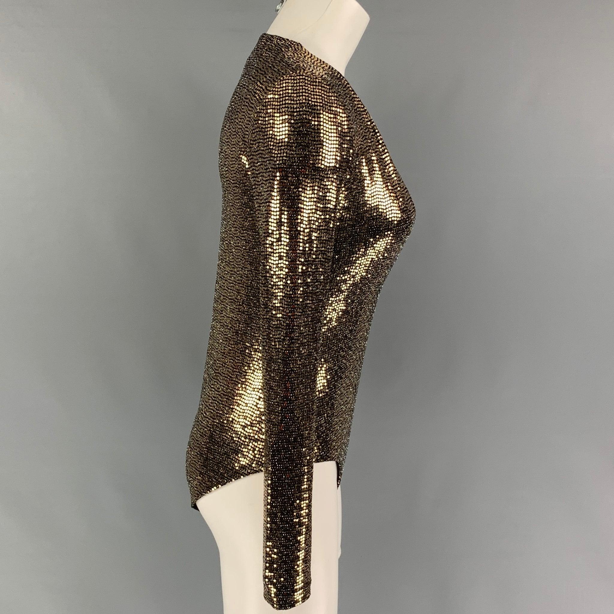 GUCCI body suit top comes in a gold & black metallic polyamide blend featuring a v-neck, long sleeve, and a snap button closure.
New With Tags.
 

Marked:   S 

Measurements: 
 
Shoulder:
14 inches Bust: 30 inches  Sleeve: 25.5 inches  Length: 26.5