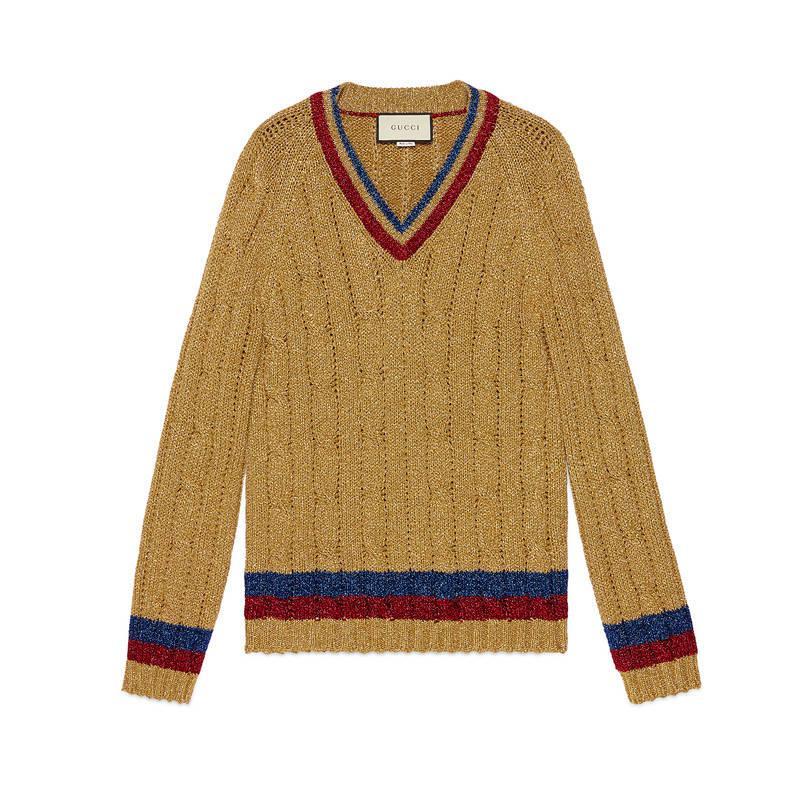 GUCCI sweater comes in a gold cable knit metallic fiber blend with a striped trim featuring a v-neck. Made in Italy.

New With Tags.
Marked: XL

Measurements:

Shoulder: 18 in. 
Chest: 42 in. 
Sleeve: 31 in. 
Length: 30.5 in. 
