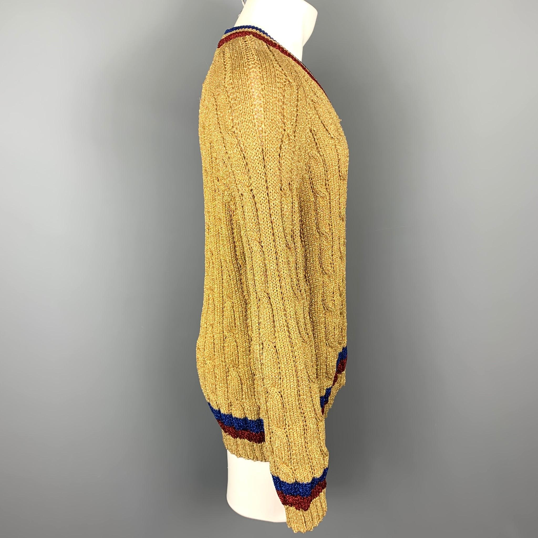 gold cable knit sweater