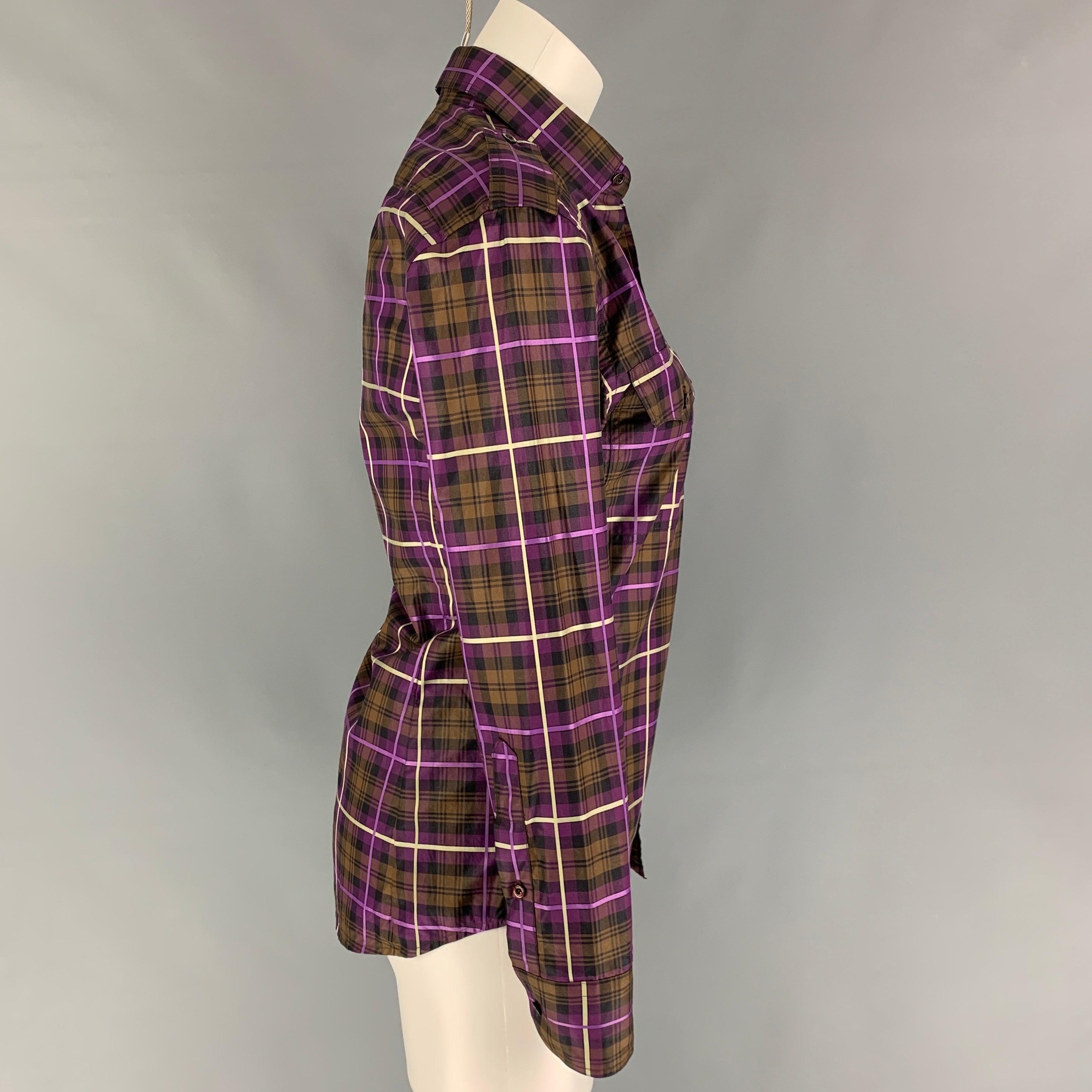 GUCCI long sleeve shirt comes in a purple & brown plaid cotton featuring epaulettes, front pockets, spread collar, and a button up closure. Made in Italy.
Very Good
Pre-Owned Condition.  

Marked:   37/14.5 

Measurements: 
 
Shoulder: 16.5 inches 
