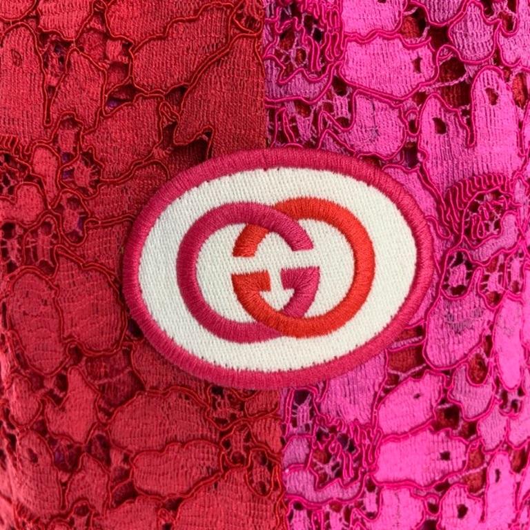 GUCCI shorts featuring lace & Intarsia in red, and pink with floral lace pattern with patch on front Slip-on styling. Slit Pockets and Drawstring. Made in Italy.New with Tags. 
 
 Marked: XS 
 
 Measurements: 
  Waist: 26 inches Rise: 12 inInseam:
