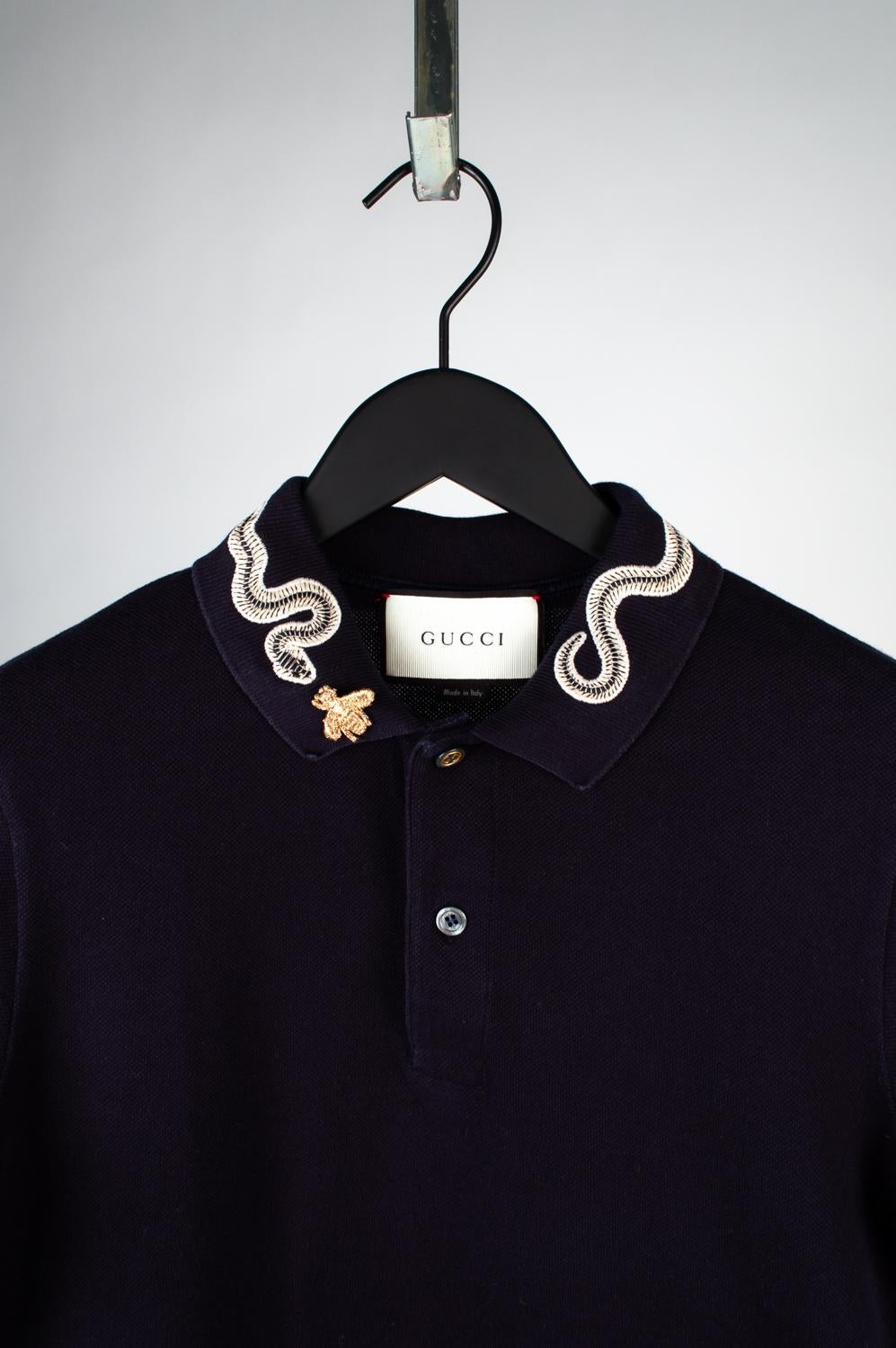 100% genuine Gucci slim men polo shirt, S601
Color: blue
(An actual color may a bit vary due to individual computer screen interpretation)
Material: 93% cotton, 7% elastane
Tag size: Small
This jumper is great quality item. Rate 8.5 of 10, excellent